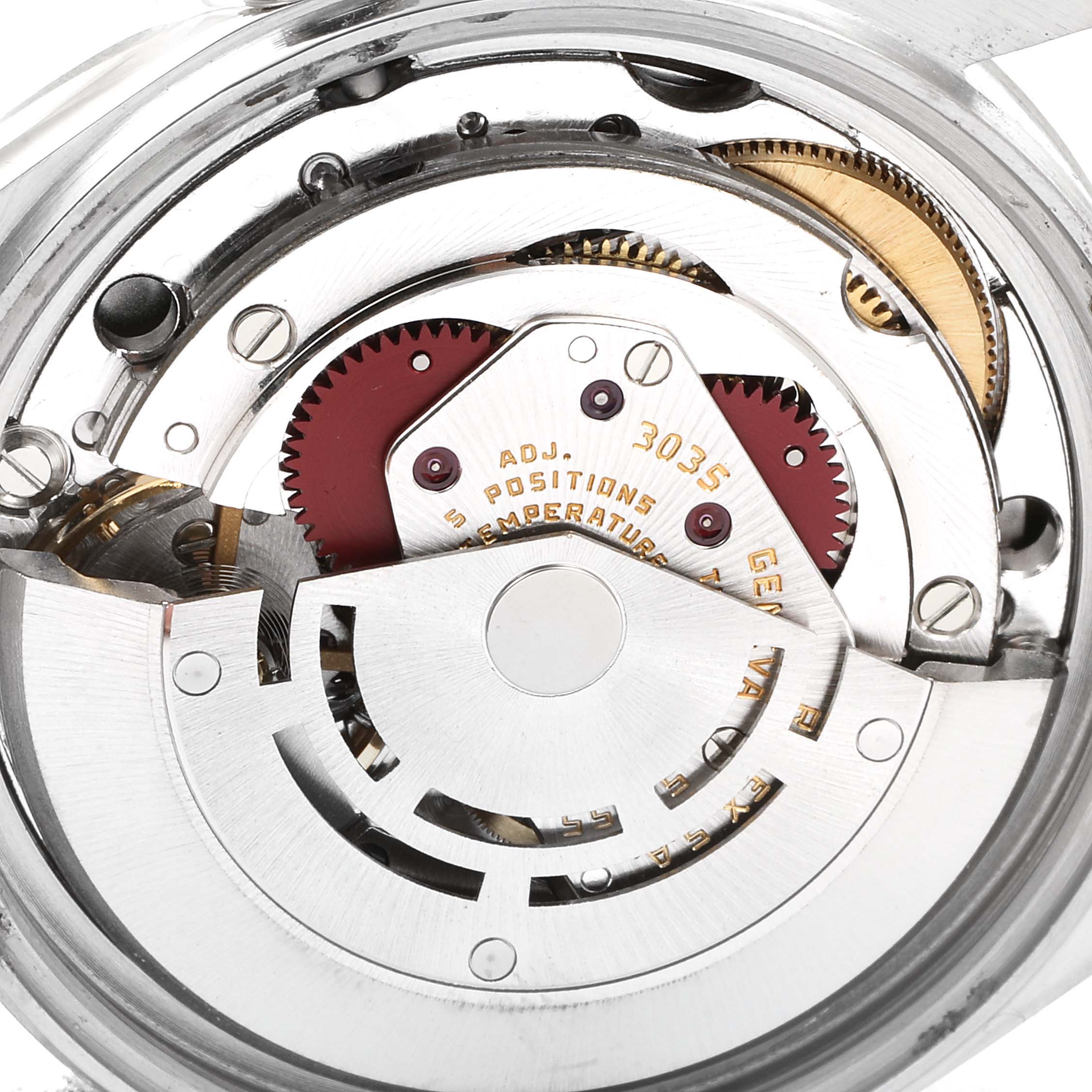 This image shows the intricate movement mechanism of a Vintage Collection Rolex model, viewed from the rear.