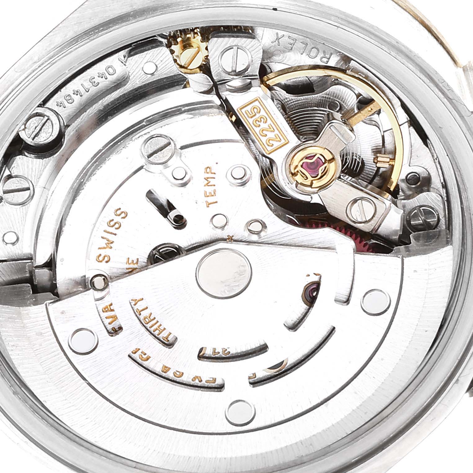 Close-up of the Rolex Datejust 79173 Women's Steel and Gold (two tone) Blue Dial 79173 Women's Steel and Gold (two tone) Blue Dial watch movement showing intricate inner mechanics and parts.