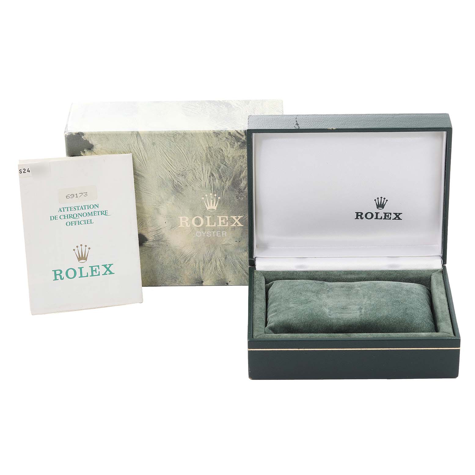 This image shows the packaging of a Rolex Datejust 69173 Women's Steel and Gold (two tone) White Dial 69173 Women's Steel and Gold (two tone) White Dial including the outer box, inner box, and official chronometer certification booklet.