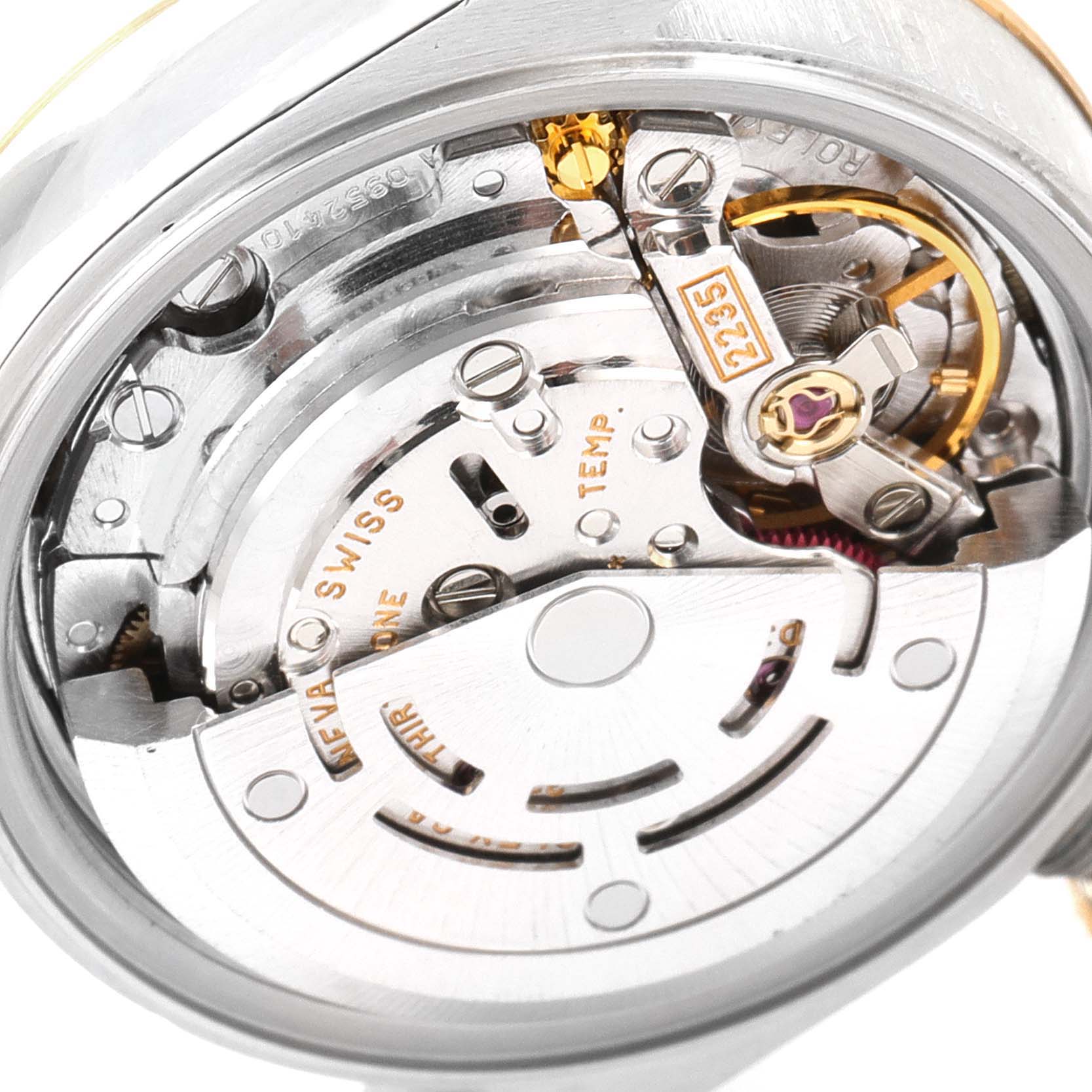 The image shows a close-up view of the movement mechanism inside a Rolex Datejust 79173 Women
s Steel and Gold (two tone) Champagne Dial 79173 Women
s Steel and Gold (two tone) Champagne Dial watch.