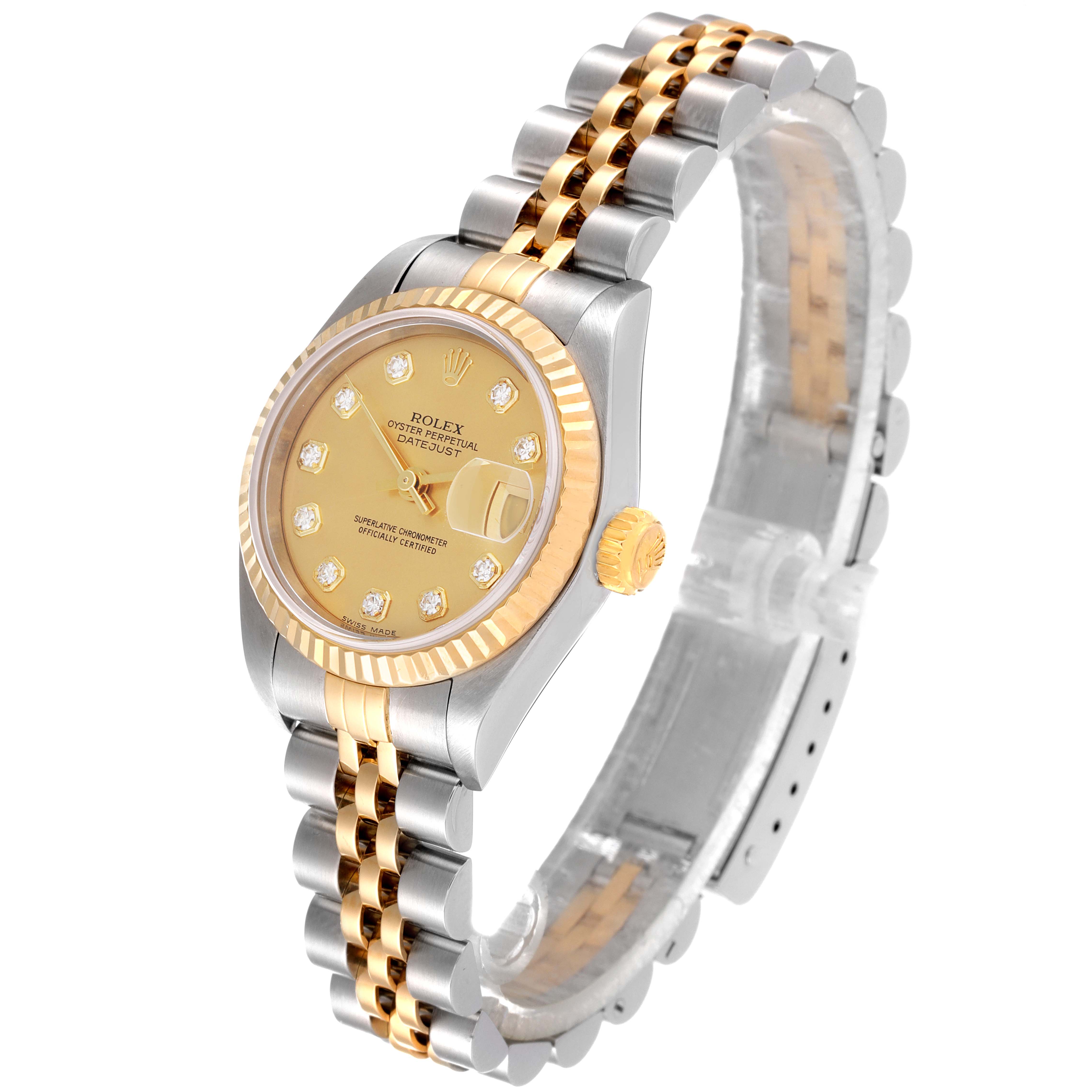 The image shows a Rolex Datejust 79173 Women
s Steel and Gold (two tone) Champagne Dial 79173 Women
s Steel and Gold (two tone) Champagne Dial watch at a three-quarter angle, highlighting its face, bezel, crown, and bracelet.
