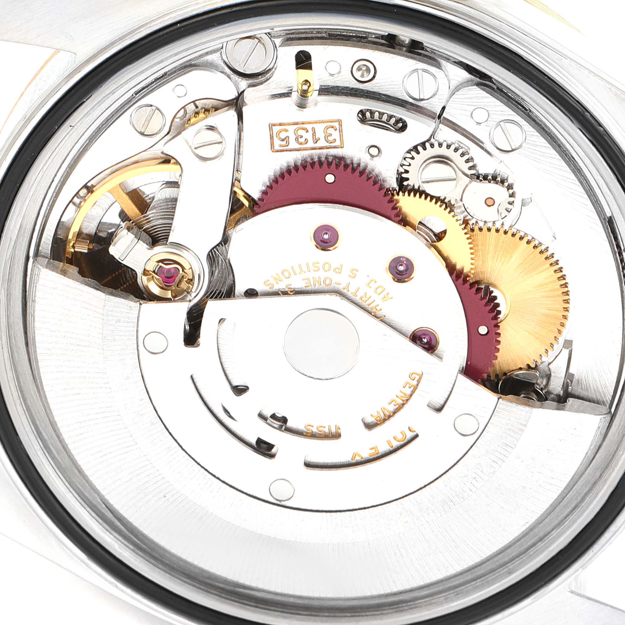 This image shows an inside view of the Rolex Datejust 16233 Men's Steel and Gold (two tone) Champagne Dial 16233 Men's Steel and Gold (two tone) Champagne Dial model's intricate movement mechanism.