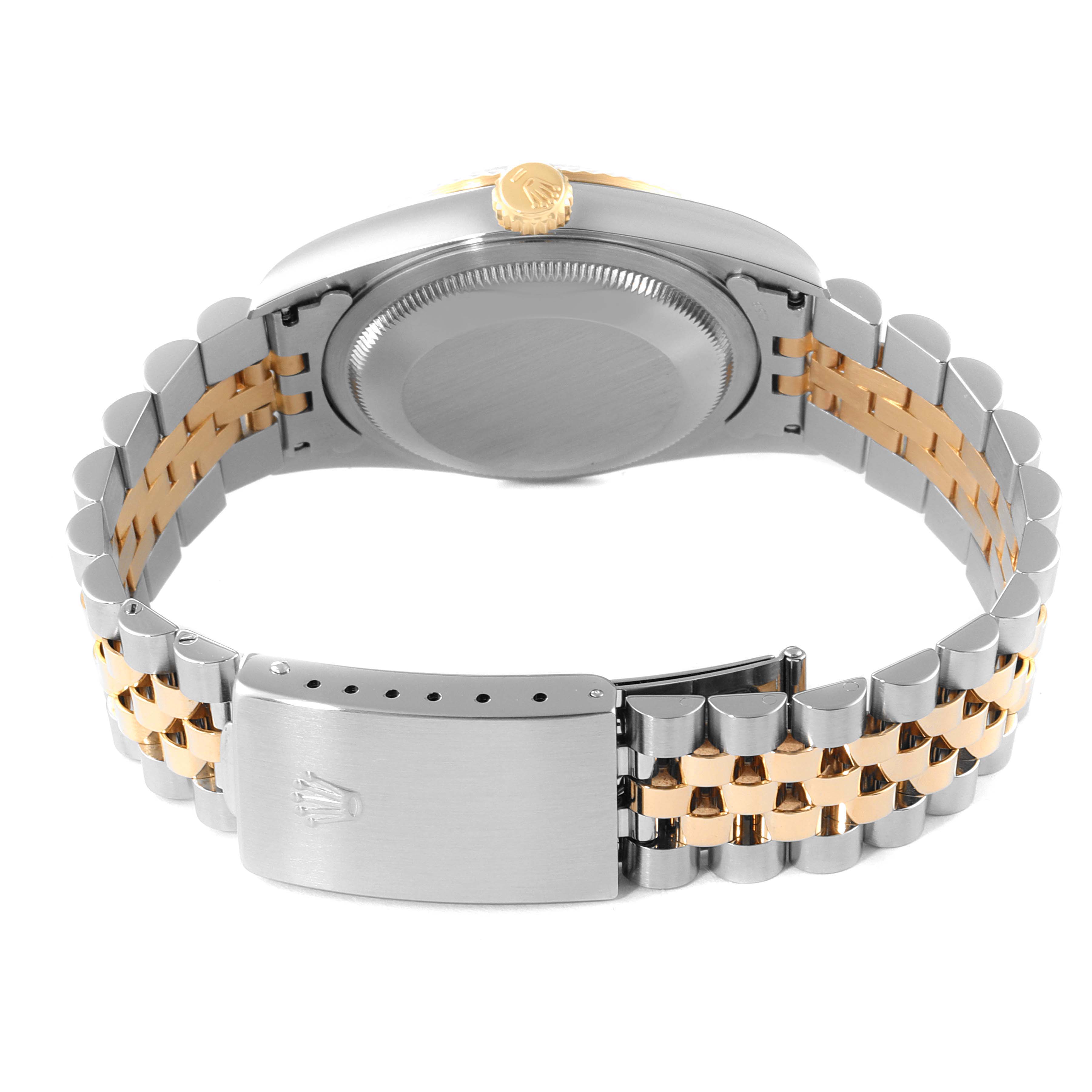 This image shows the back view of a Rolex Datejust 16233 Men
s Steel and Gold (two tone) Champagne Dial 16233 Men
s Steel and Gold (two tone) Champagne Dial watch, highlighting the bracelet and clasp.