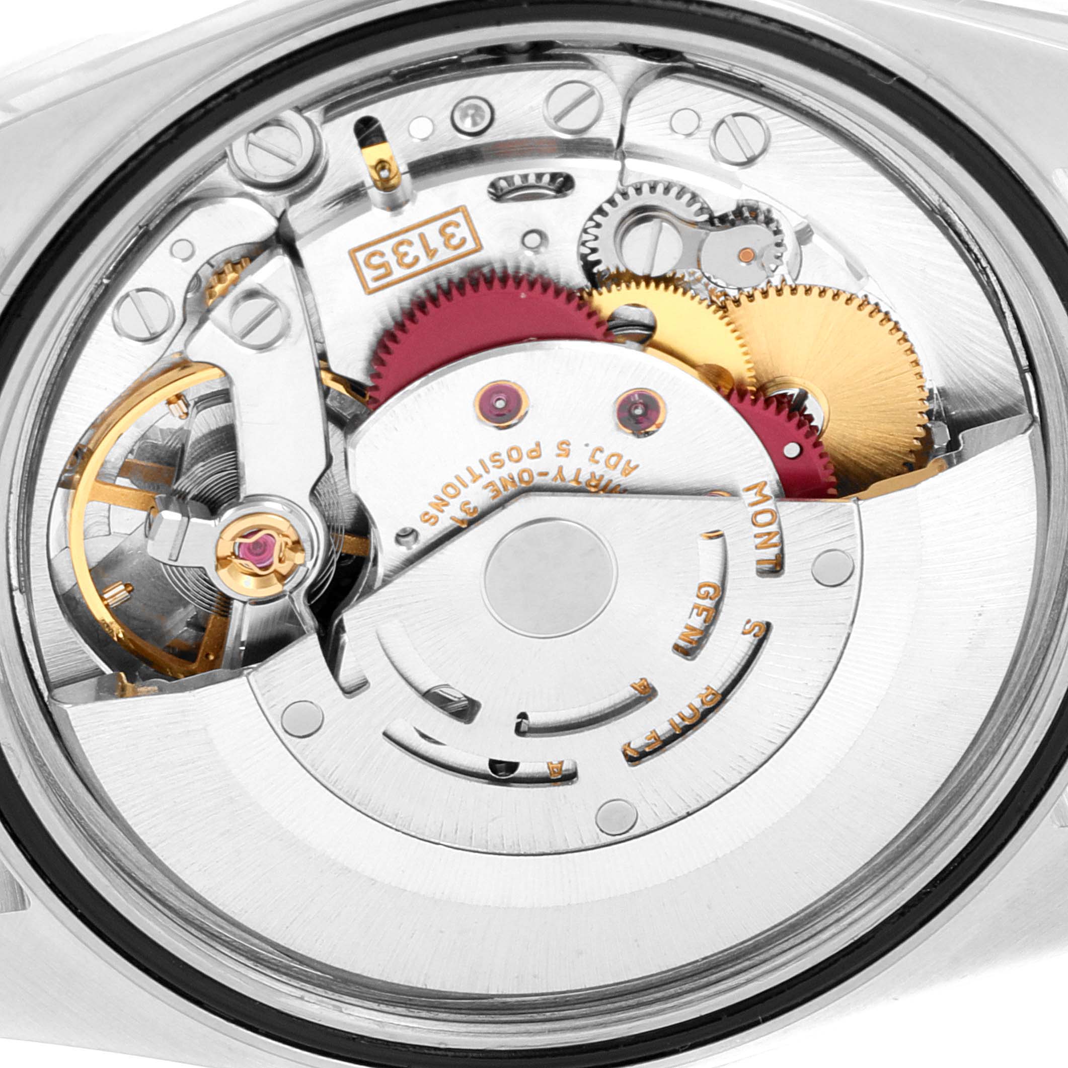 This image shows the internal mechanism of a Rolex Datejust 16233 Men
s Steel and Gold (two tone) Champagne Dial 16233 Men
s Steel and Gold (two tone) Champagne Dial watch viewed from the back, highlighting its gears and movement parts.