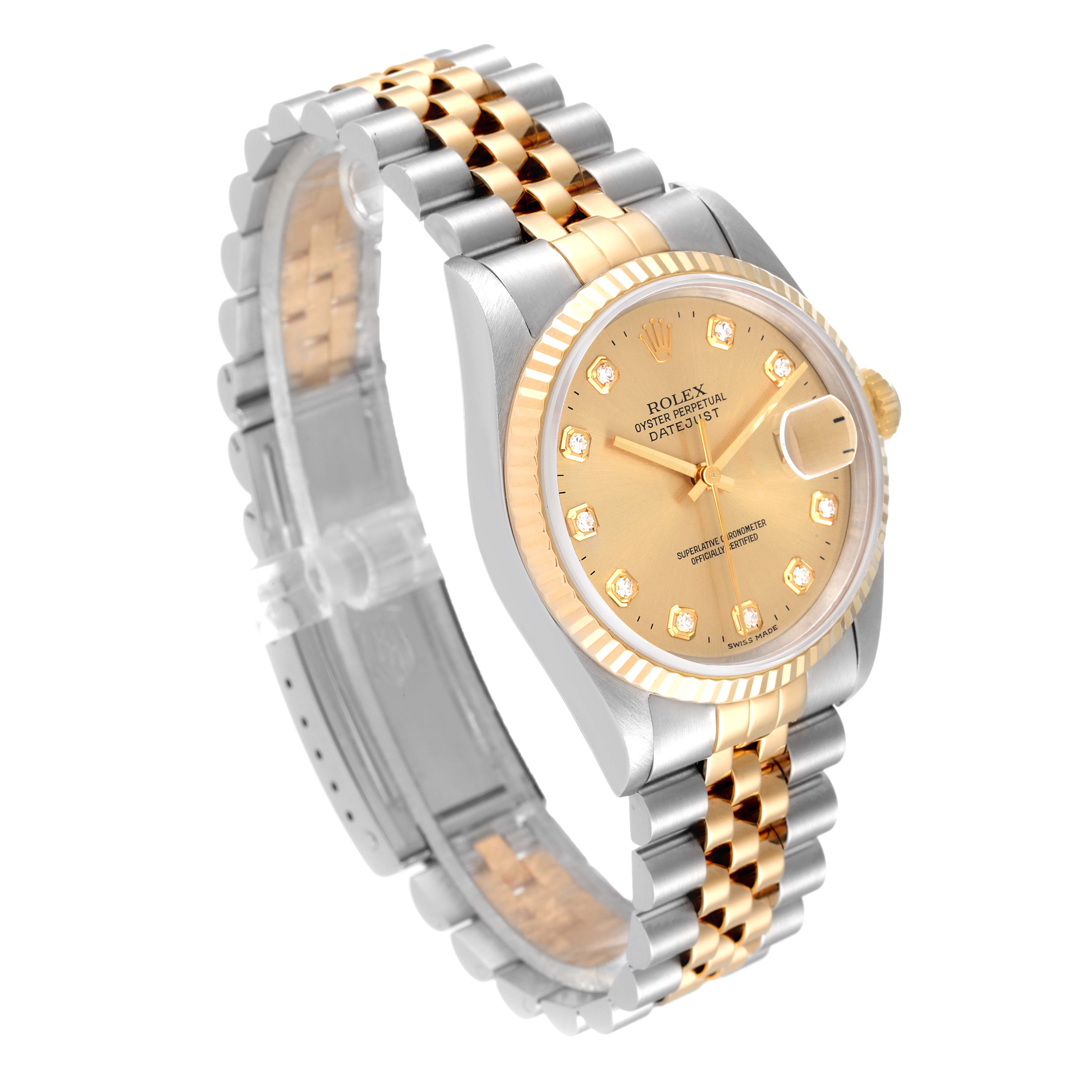 The Rolex Datejust 16233 Men's Steel and Gold (two tone) Champagne Dial 16233 Men's Steel and Gold (two tone) Champagne Dial watch is shown at a slight angle, displaying its face, two-tone bracelet, and fluted bezel.
