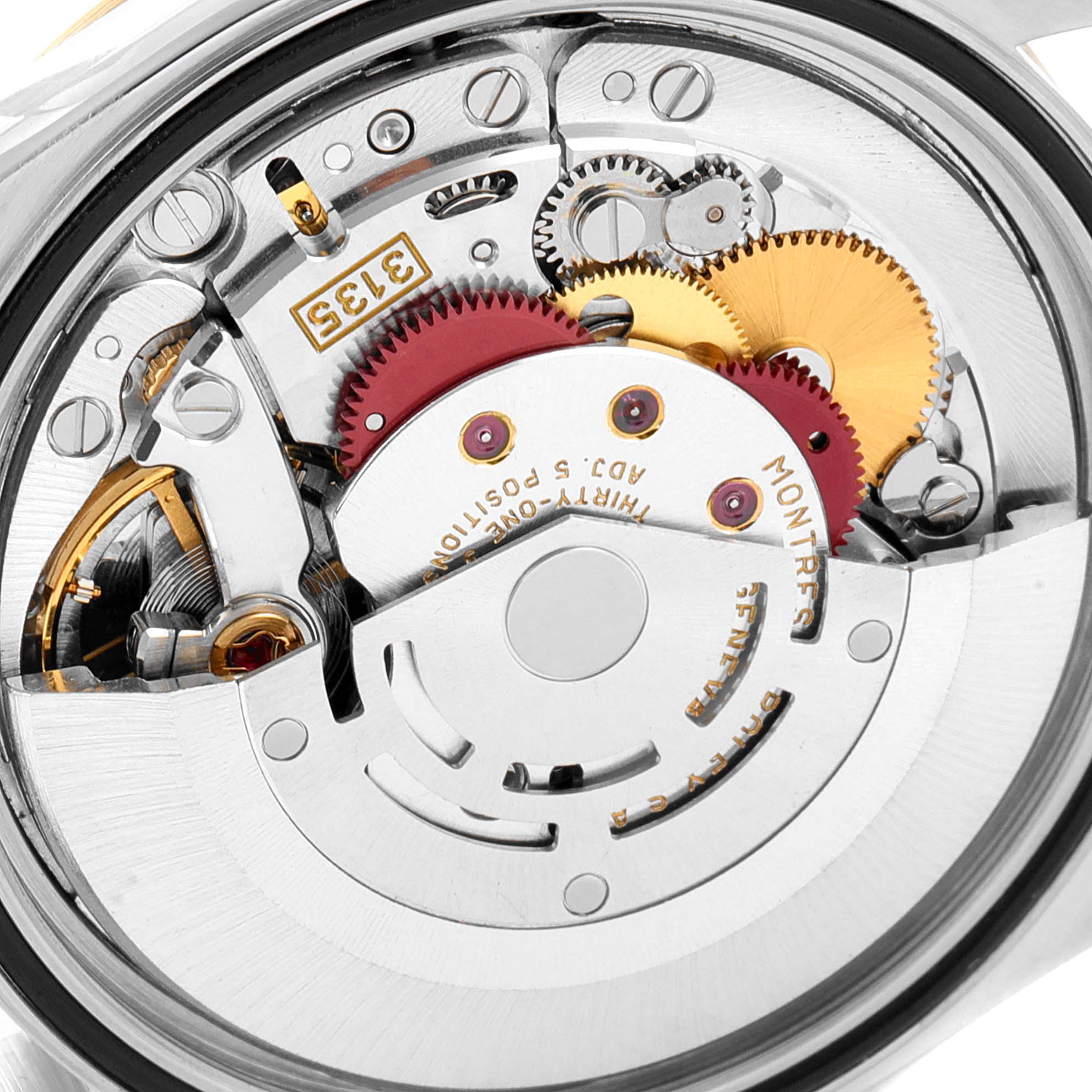 This close-up angle displays the intricate internal mechanism of the Rolex Datejust 16233 Men's Steel and Gold (two tone) Champagne Dial 16233 Men's Steel and Gold (two tone) Champagne Dial watch.