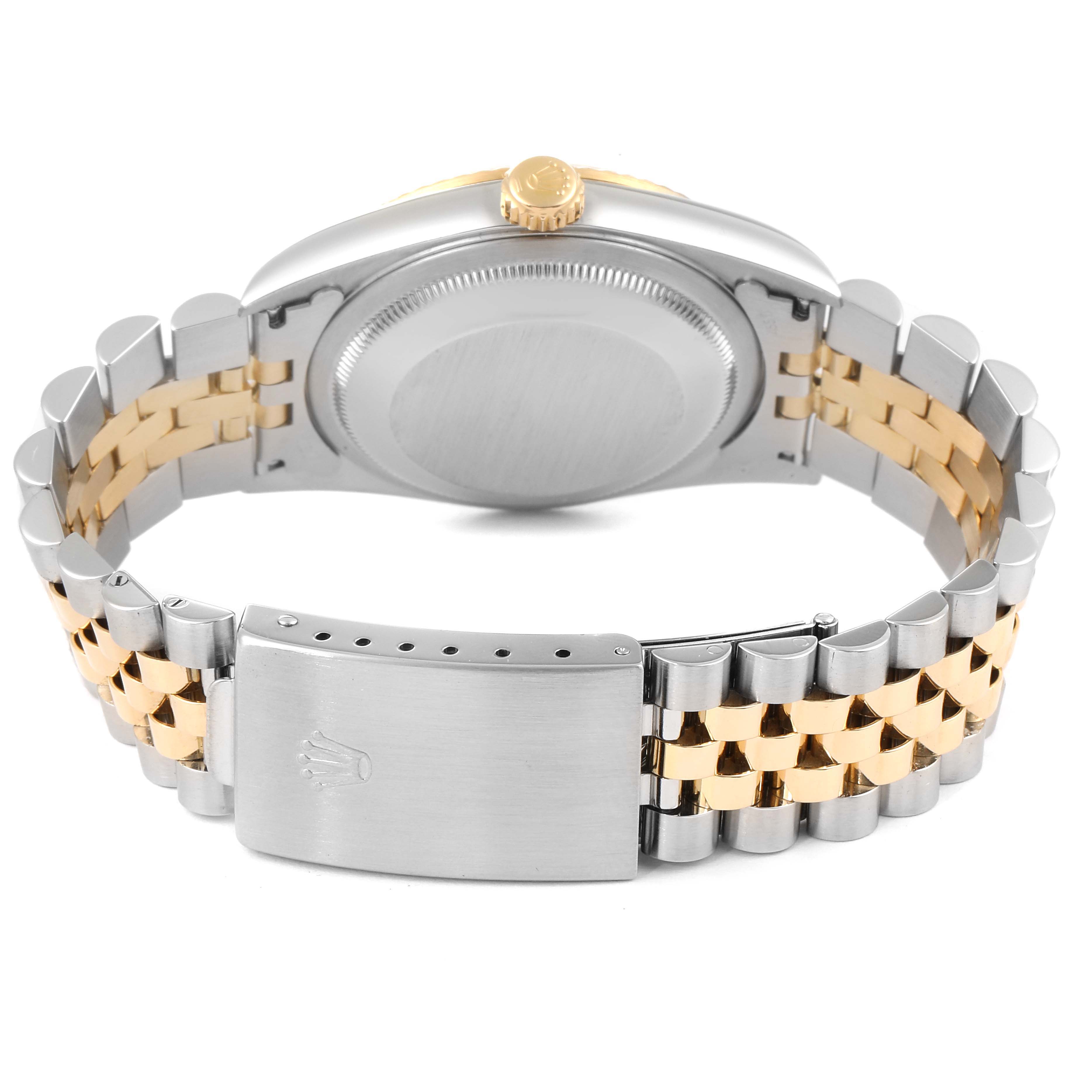 The image shows the backside of the Rolex Datejust 16233 Men's Steel and Gold (two tone) Champagne Dial 16233 Men's Steel and Gold (two tone) Champagne Dial watch, highlighting its case back, crown, and two-tone bracelet with a clasp.