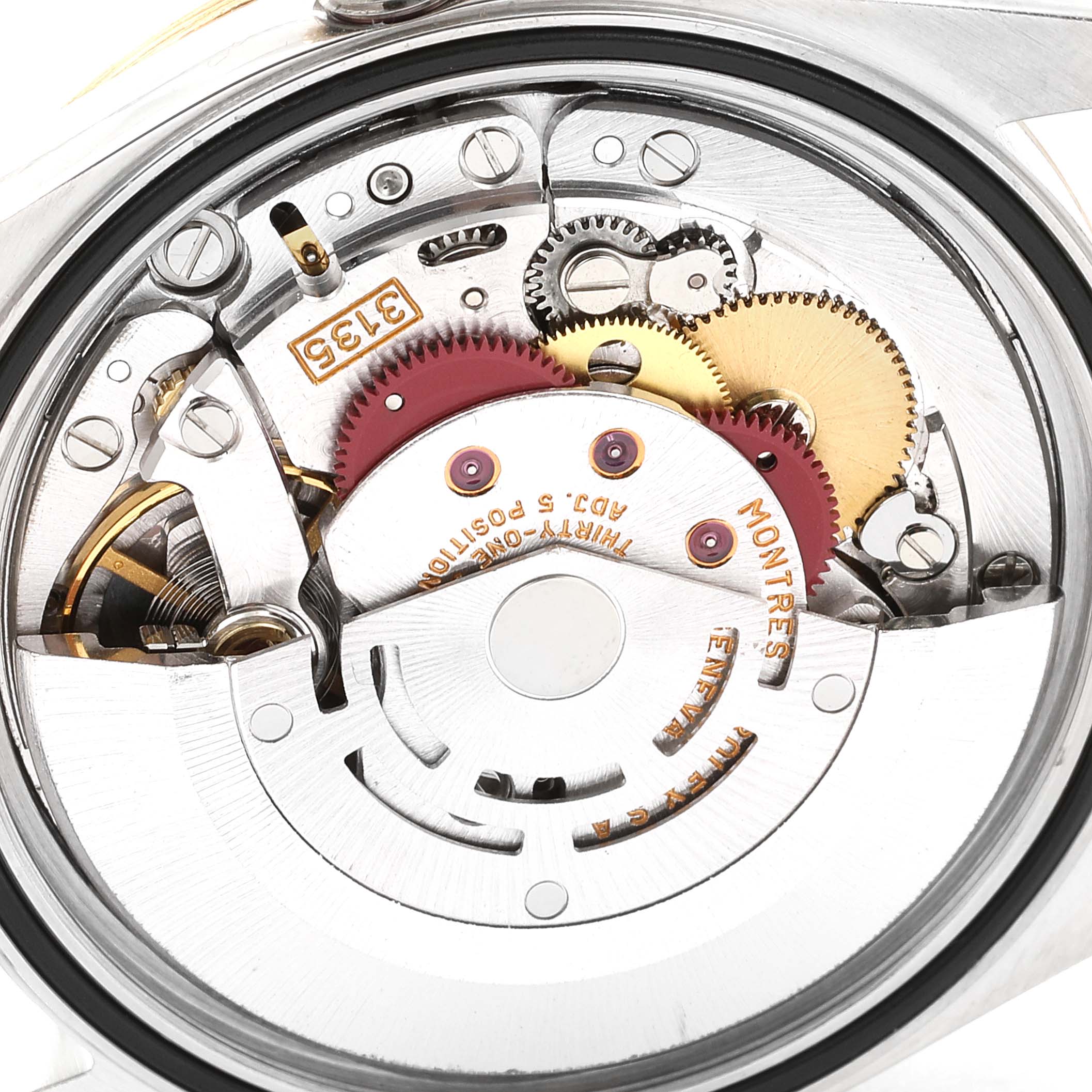This image shows a close-up of the internal movement and components of a Rolex Datejust 16233 Men's Steel and Gold (two tone) White Dial 16233 Men's Steel and Gold (two tone) White Dial watch.