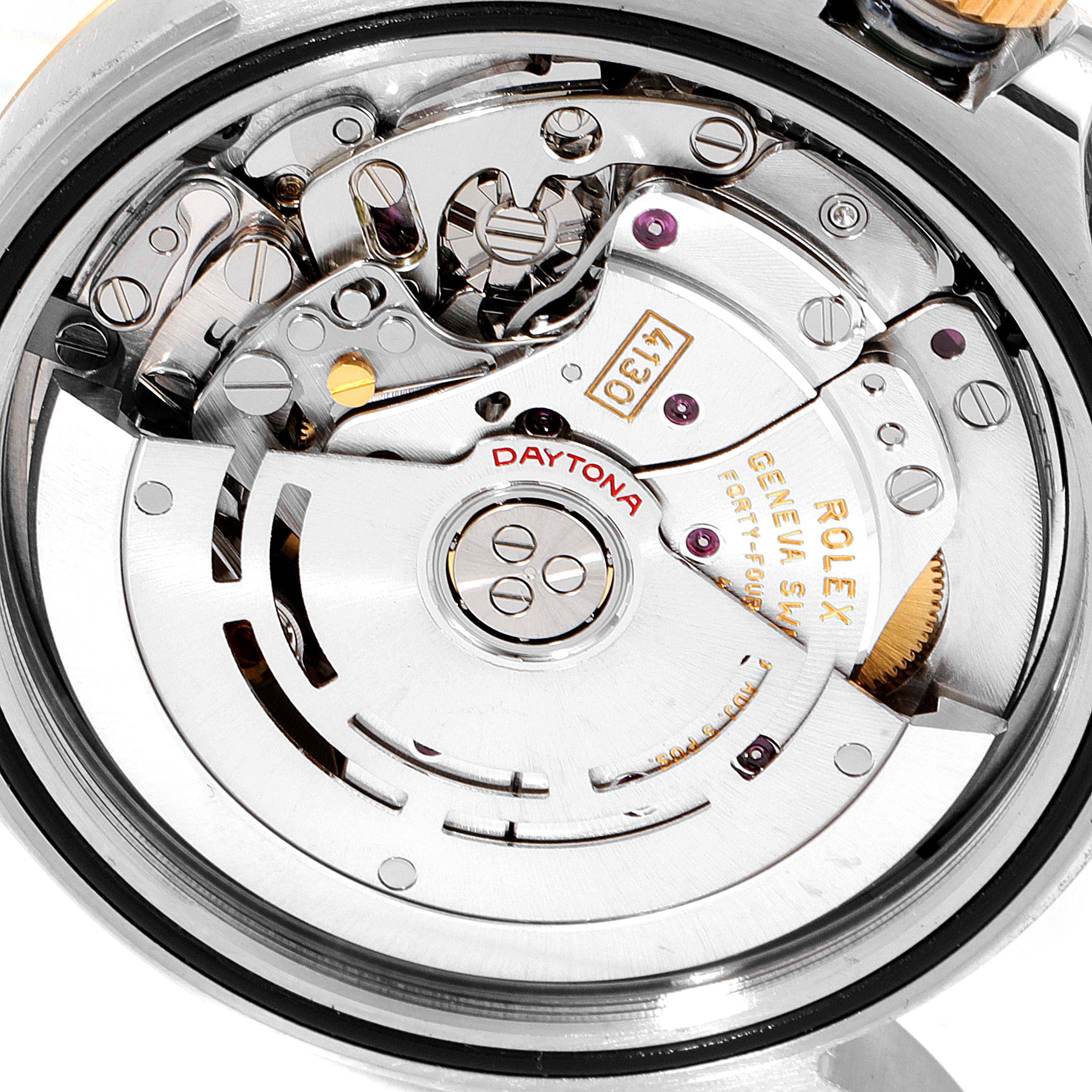 This image shows a close-up view of the movement mechanism of a Rolex Daytona 116523 Men
s Steel and Gold (two tone) Blue Dial 116523 Men
s Steel and Gold (two tone) Blue Dial watch.