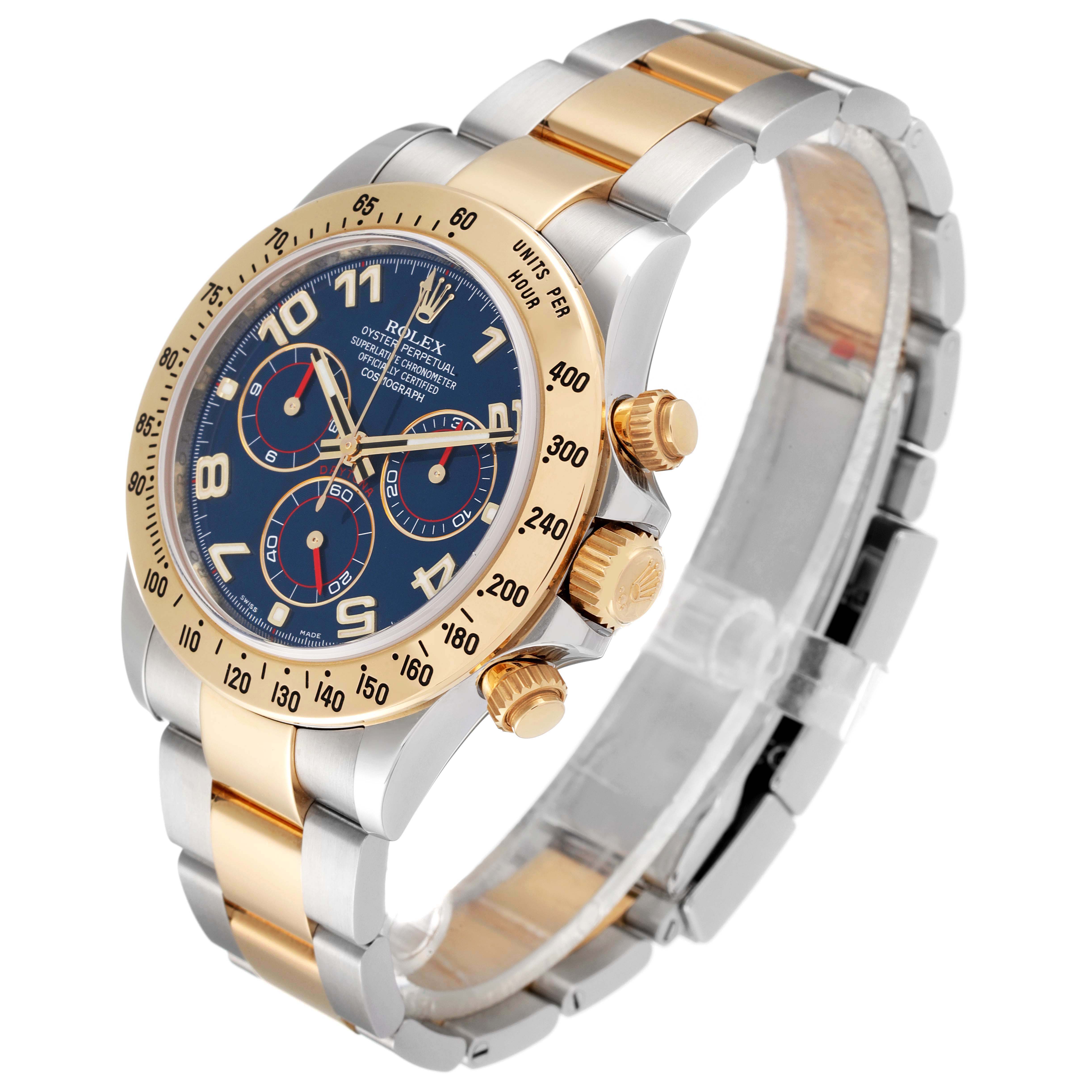 The image shows a close-up angle of a Rolex Daytona 116523 Men
s Steel and Gold (two tone) Blue Dial 116523 Men
s Steel and Gold (two tone) Blue Dial watch, highlighting the face, bezel, crown, and bracelet.