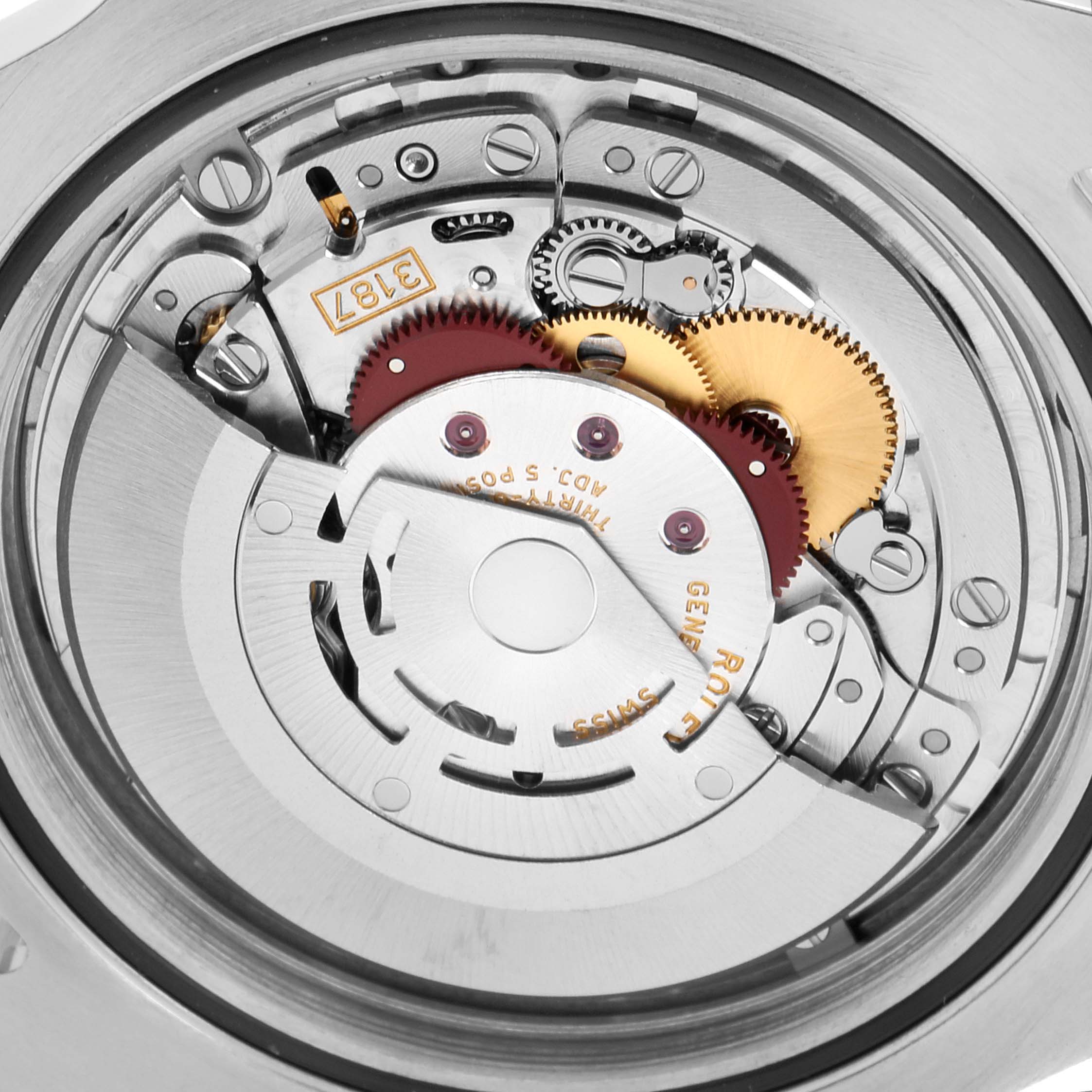 This image shows the intricate internal mechanism of a Rolex Explorer 216570 Men
s Stainless Steel White Dial 216570 Men
s Stainless Steel White Dial model watch from a close-up, top-down angle.