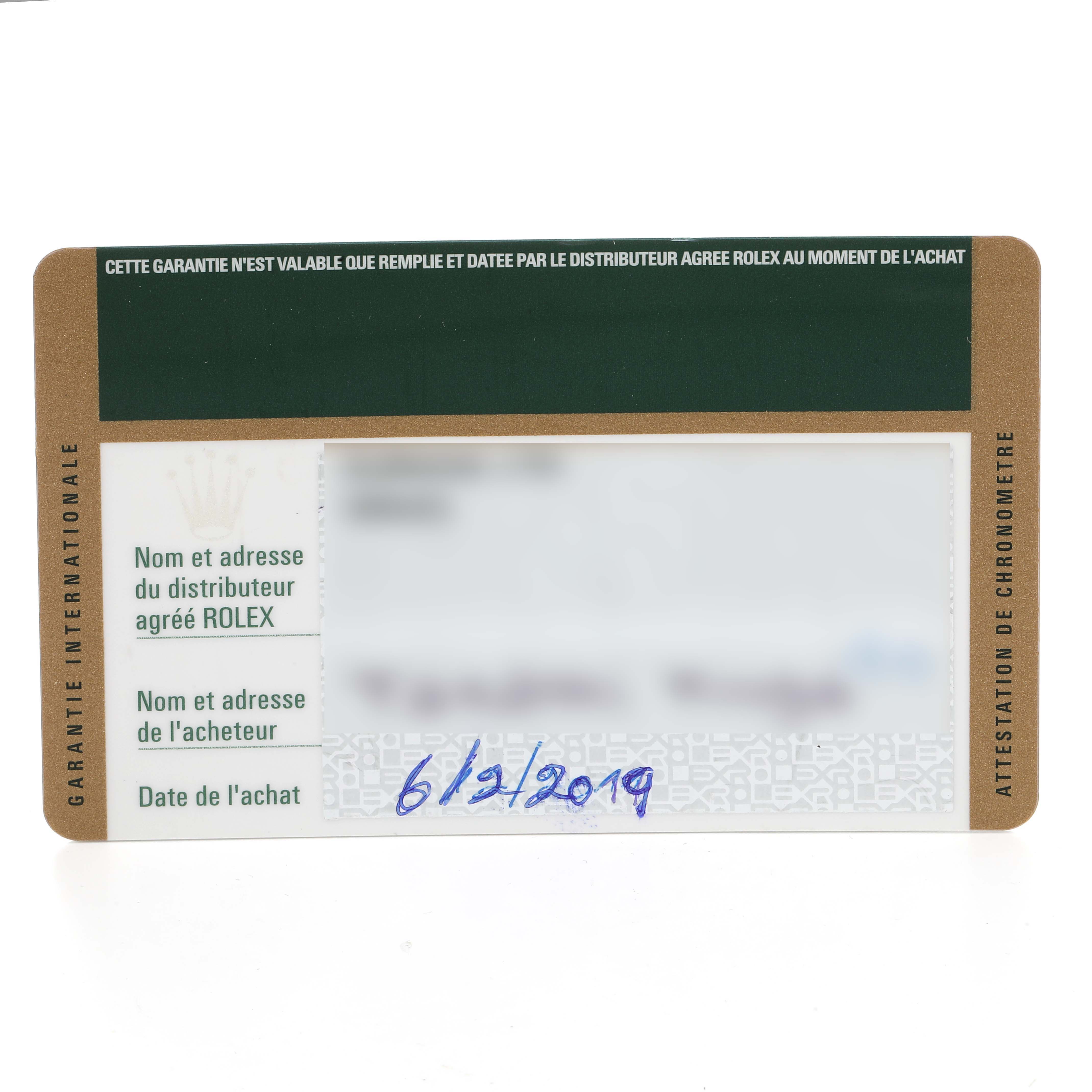 This image shows a warranty card for a Rolex Explorer 216570 Men
s Stainless Steel White Dial 216570 Men
s Stainless Steel White Dial watch, including purchase date and distributor details.