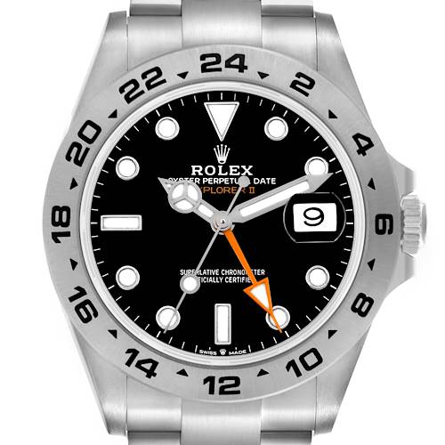 The Rolex Explorer II watch is shown from a front angle, highlighting the dial, bezel, and crown.