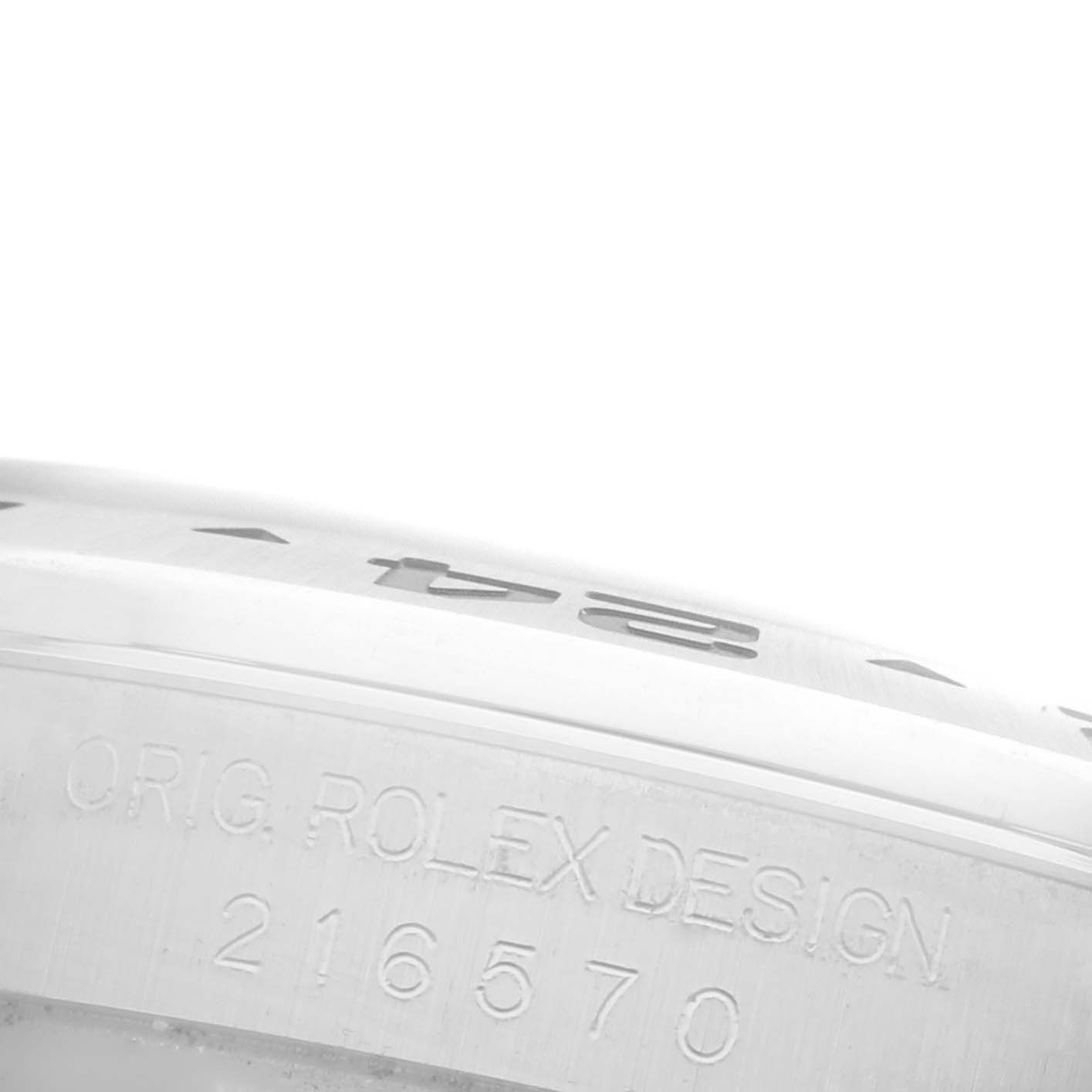 The image shows a side view of the Rolex Explorer 216570 Men's Stainless Steel White Dial 216570 Men's Stainless Steel White Dial's case edge with engraved model number and branding.