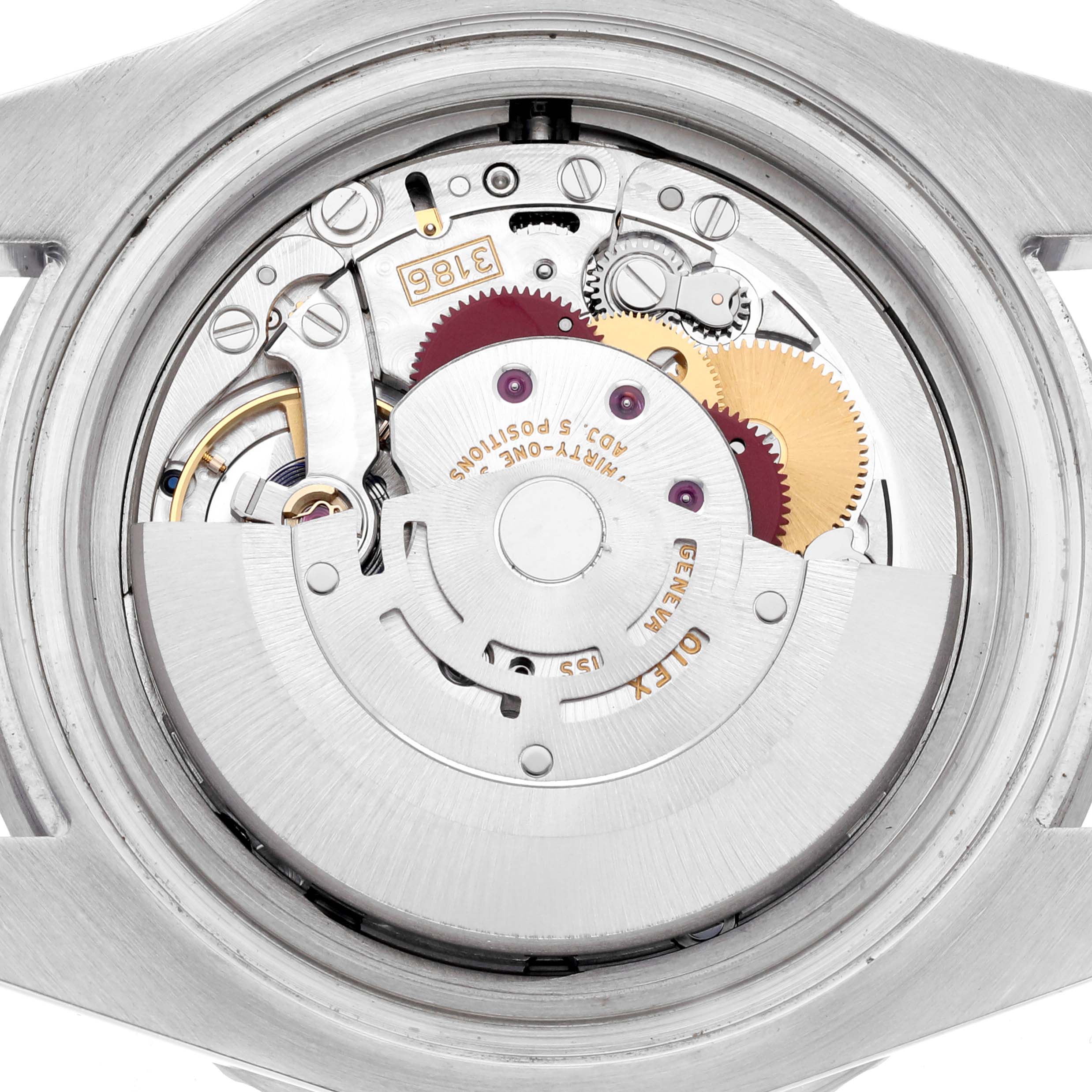 The image shows a detailed view of the movement inside a Rolex GMT-Master 116710LN Men's Stainless Steel Black Dial 116710LN Men's Stainless Steel Black Dial watch case back.