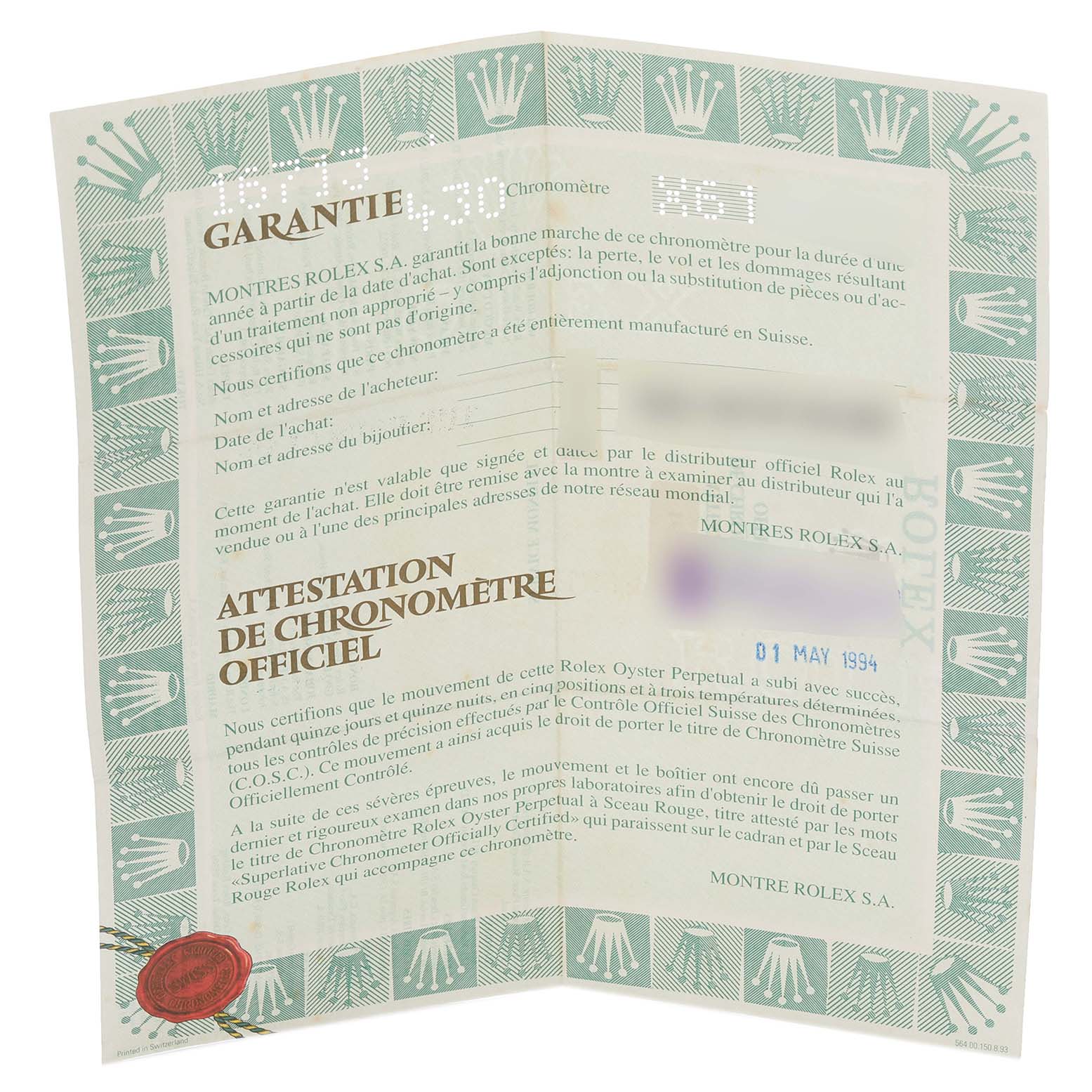 The image shows a folded Rolex GMT-Master 16713 Men's Steel and Gold (two tone) Black Dial 16713 Men's Steel and Gold (two tone) Black Dial warranty certificate with branding and text detailing guarantee information.