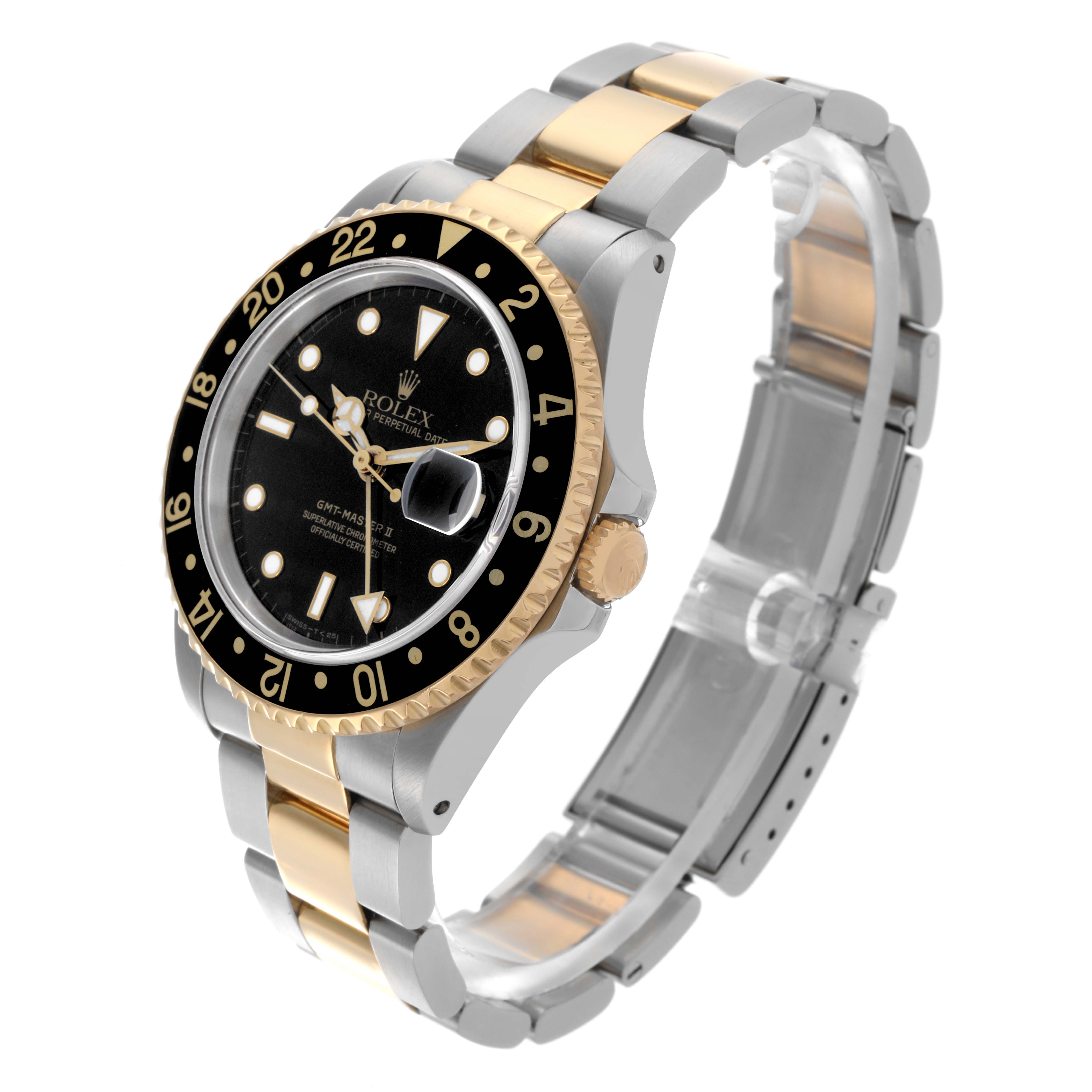 The Rolex GMT-Master 16713 Men's Steel and Gold (two tone) Black Dial 16713 Men's Steel and Gold (two tone) Black Dial watch is shown at a three-quarter angle, highlighting its bezel, dial, and two-tone bracelet.