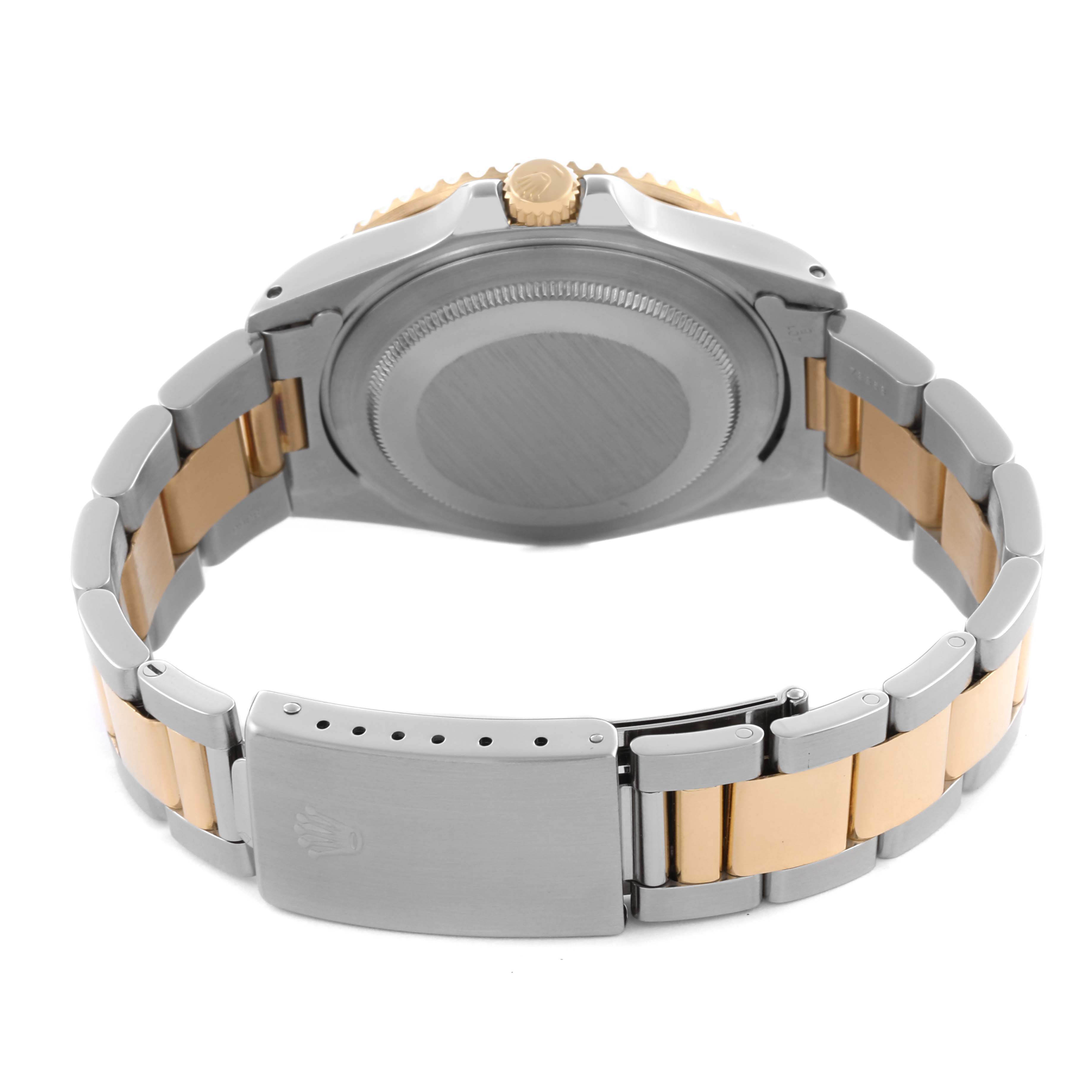 The image shows the back and bracelet of a Rolex GMT-Master 16713 Men's Steel and Gold (two tone) Black Dial 16713 Men's Steel and Gold (two tone) Black Dial, focusing on the case back and clasp.