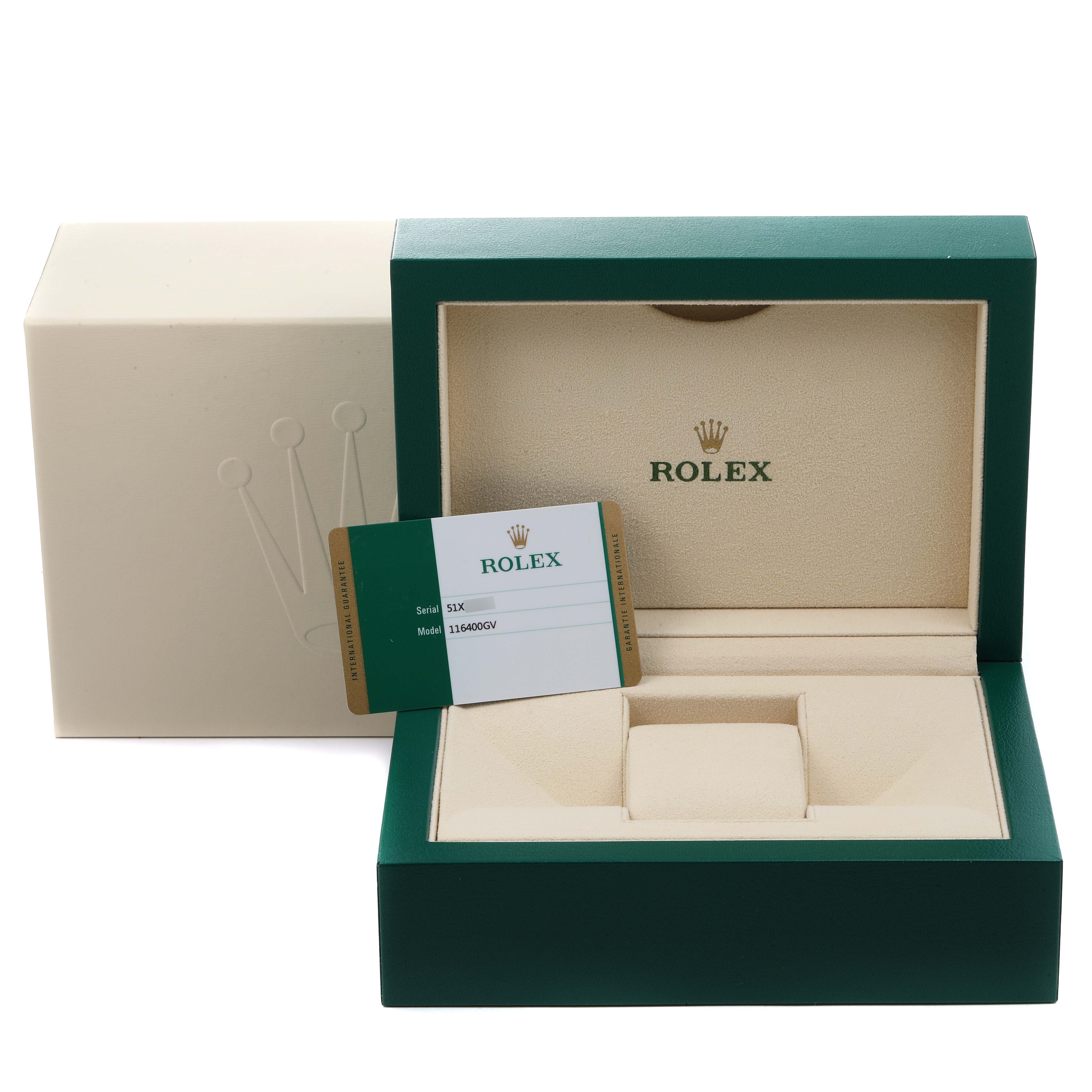 The image shows an open Rolex watch box and documentation for the Milgauss model.