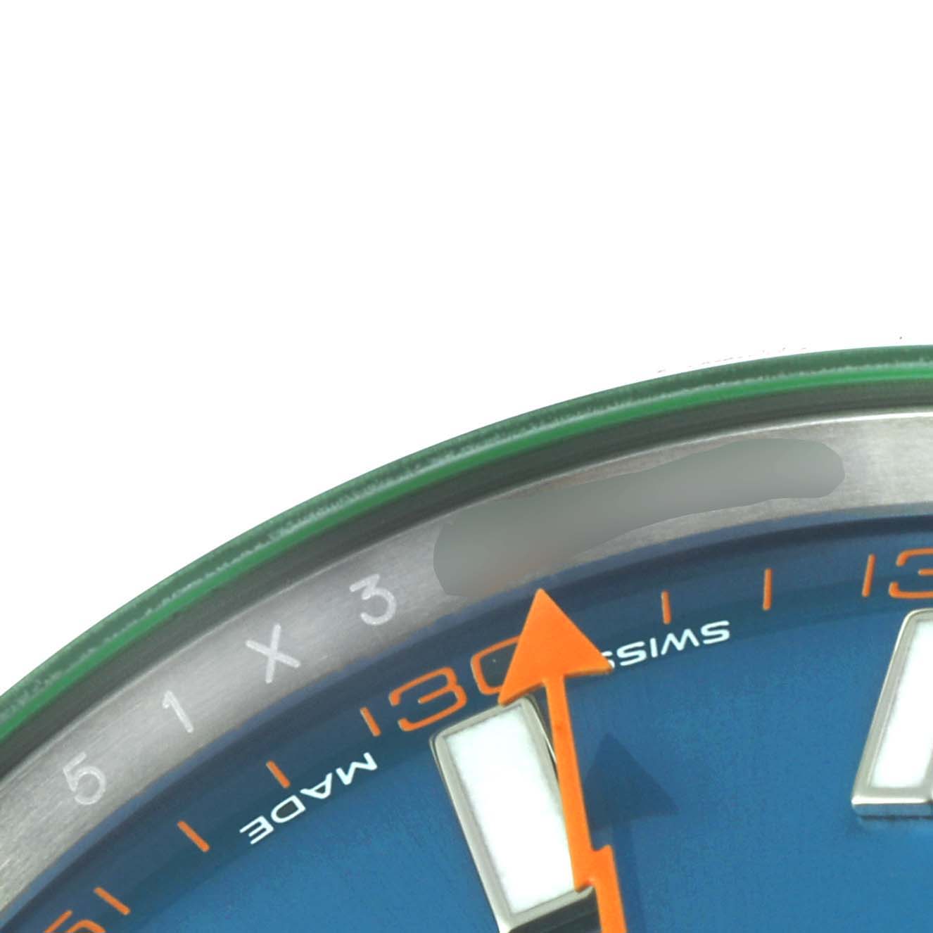 The image shows a close-up of the dial and second hand of a Rolex Milgauss 116400GV Men's Stainless Steel Blue Dial 116400GV Men's Stainless Steel Blue Dial watch, focusing on the 5 to 10 minute markers.