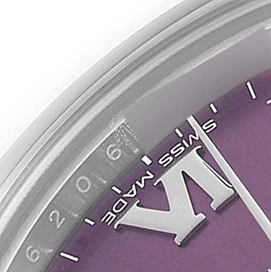 This is a close-up image of the Rolex Mid-Size 177200 Women's Stainless Steel Burgundy Dial 177200 Women's Stainless Steel Burgundy Dial watch's dial, showing part of the "VI" hour marker and "Swiss Made" text.