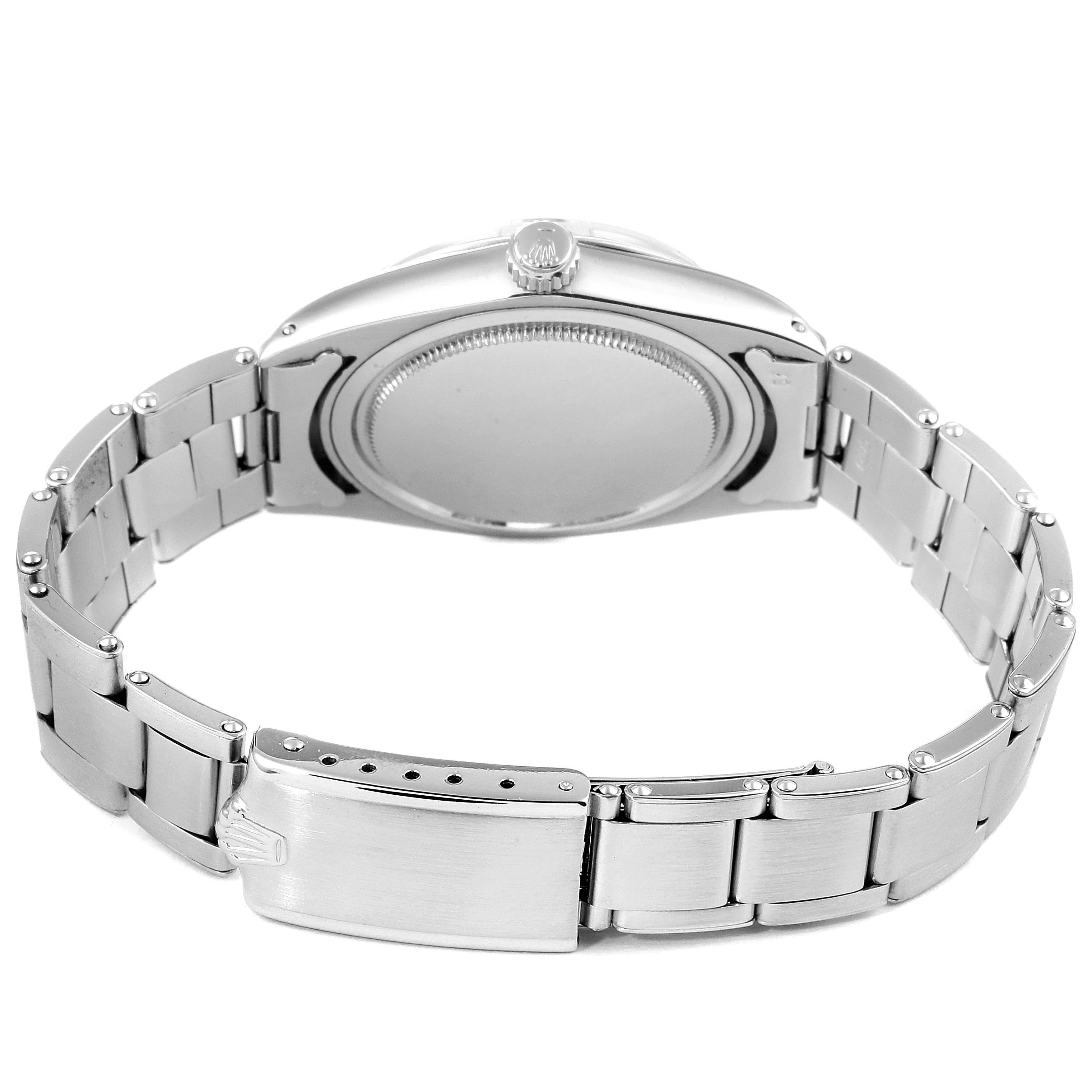 This image shows the back view, clasp, and bracelet of a Rolex Vintage Collection 6694 Men's Stainless Steel Silver Dial 6694 Men's Stainless Steel Silver Dial watch.