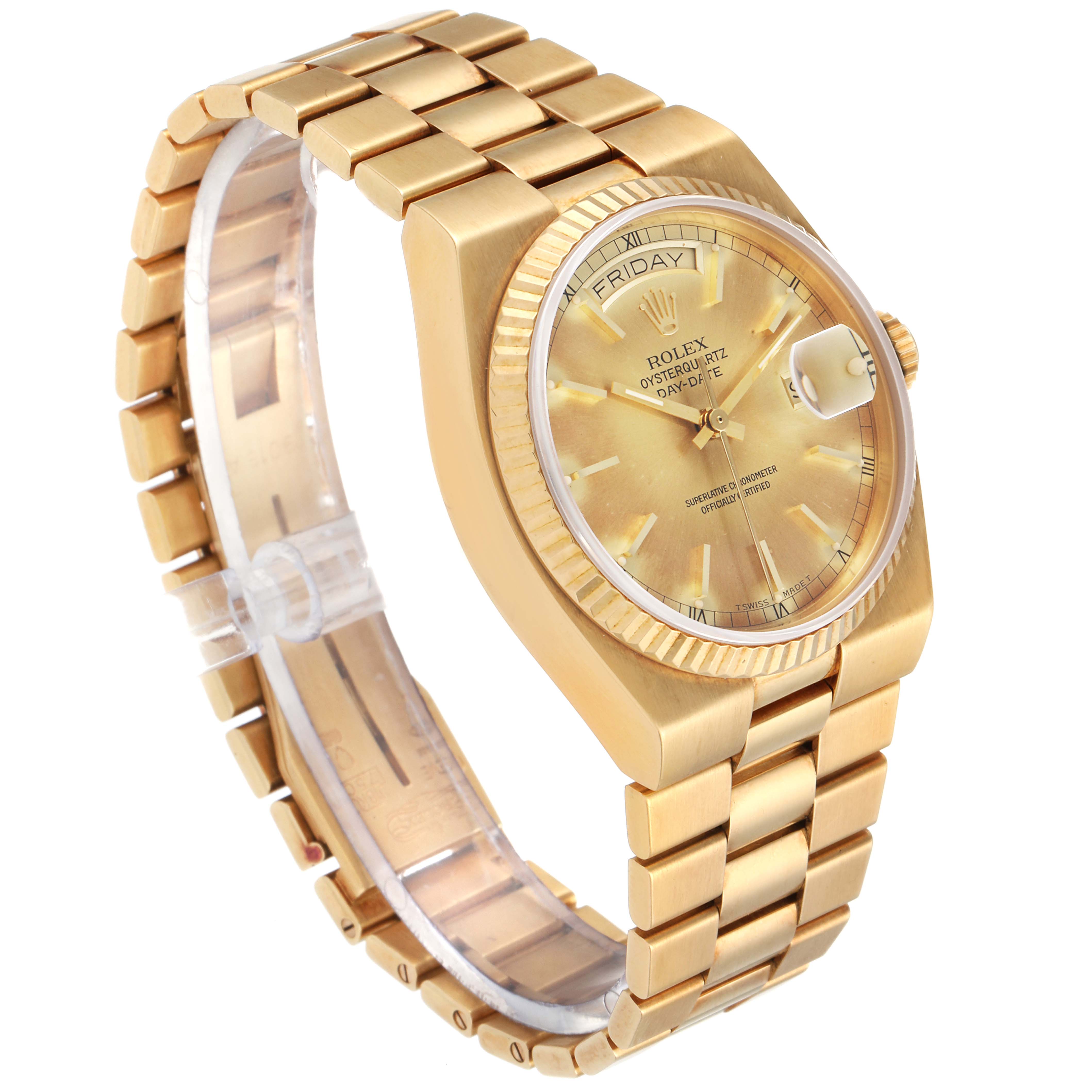 The Rolex Oysterquartz 19018 Men
s Yellow Gold Champagne Dial 19018 Men
s Yellow Gold Champagne Dial watch is shown from a slight side angle, displaying its gold bracelet, case, and face.