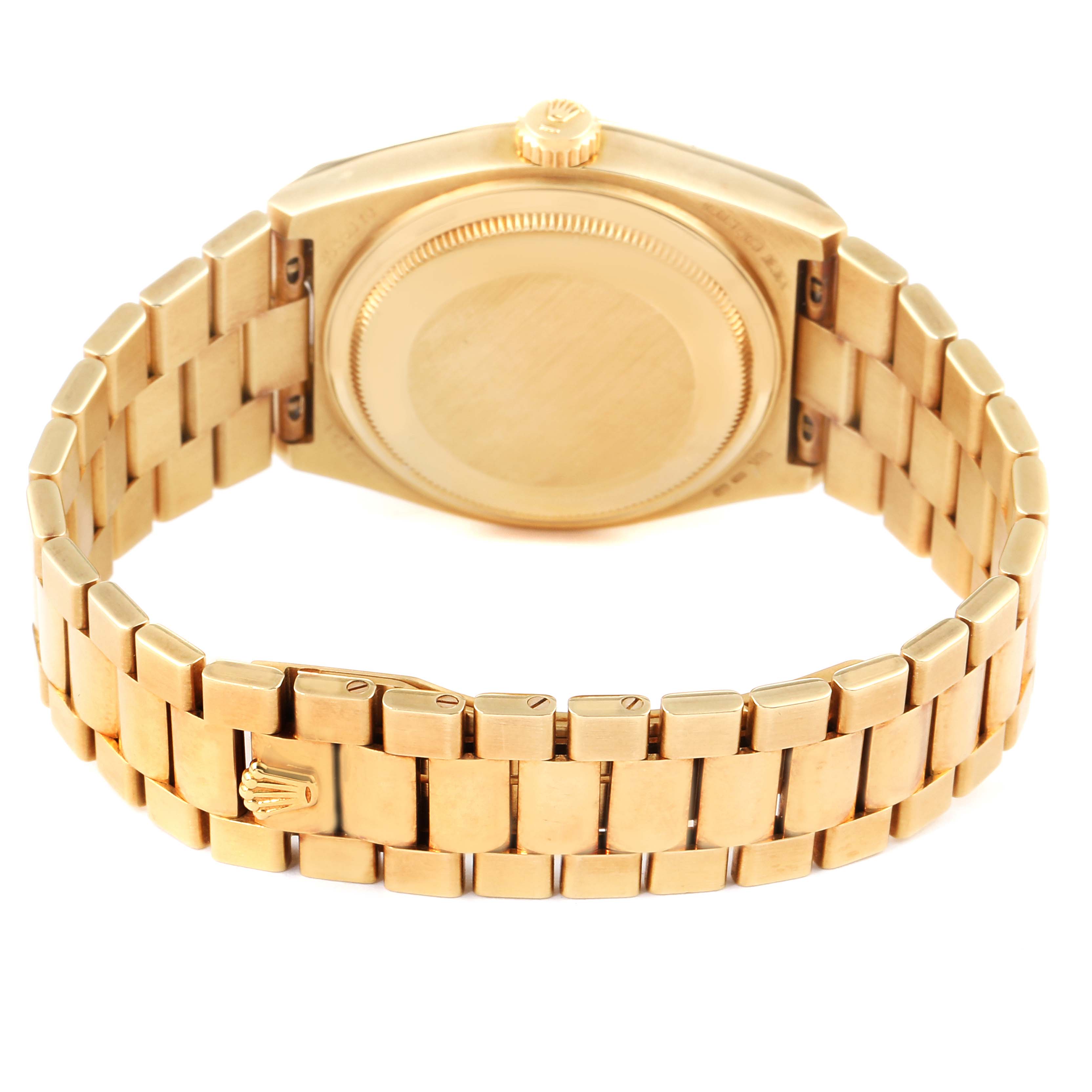 The image shows the back and bracelet of the Rolex Oysterquartz 19018 Men
s Yellow Gold Champagne Dial 19018 Men
s Yellow Gold Champagne Dial watch, focusing on the clasp and case back.