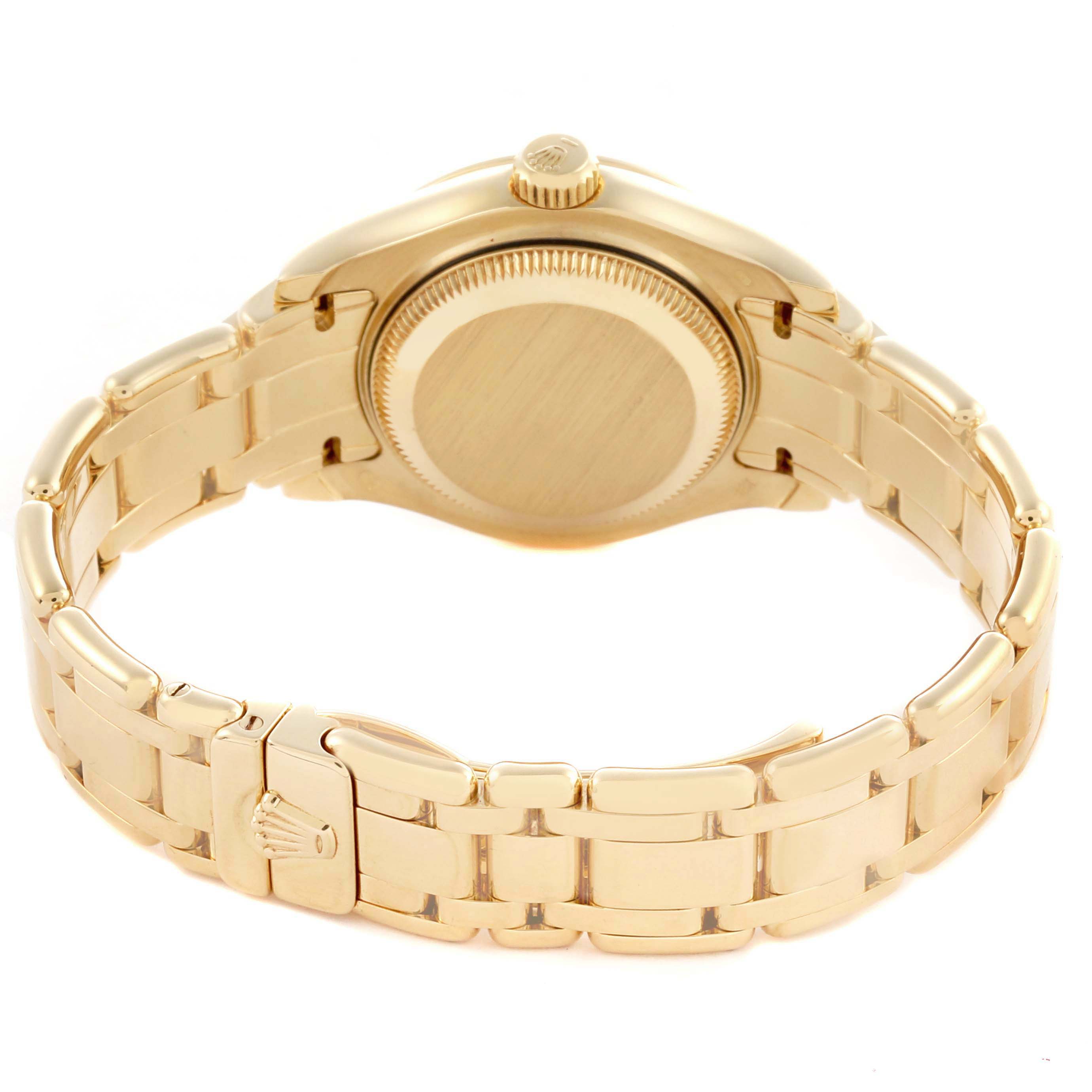 The image shows the back and side view of a Rolex Pearlmaster 69298 Women's Yellow Gold Mother of Pearl Dial 69298 Women's Yellow Gold Mother of Pearl Dial watch with its bracelet and clasp.