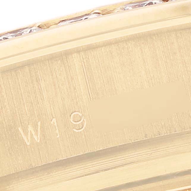 The image shows a close-up of the engraved inner part of a Rolex Pearlmaster 69298 Women's Yellow Gold Mother of Pearl Dial 69298 Women's Yellow Gold Mother of Pearl Dial watch.