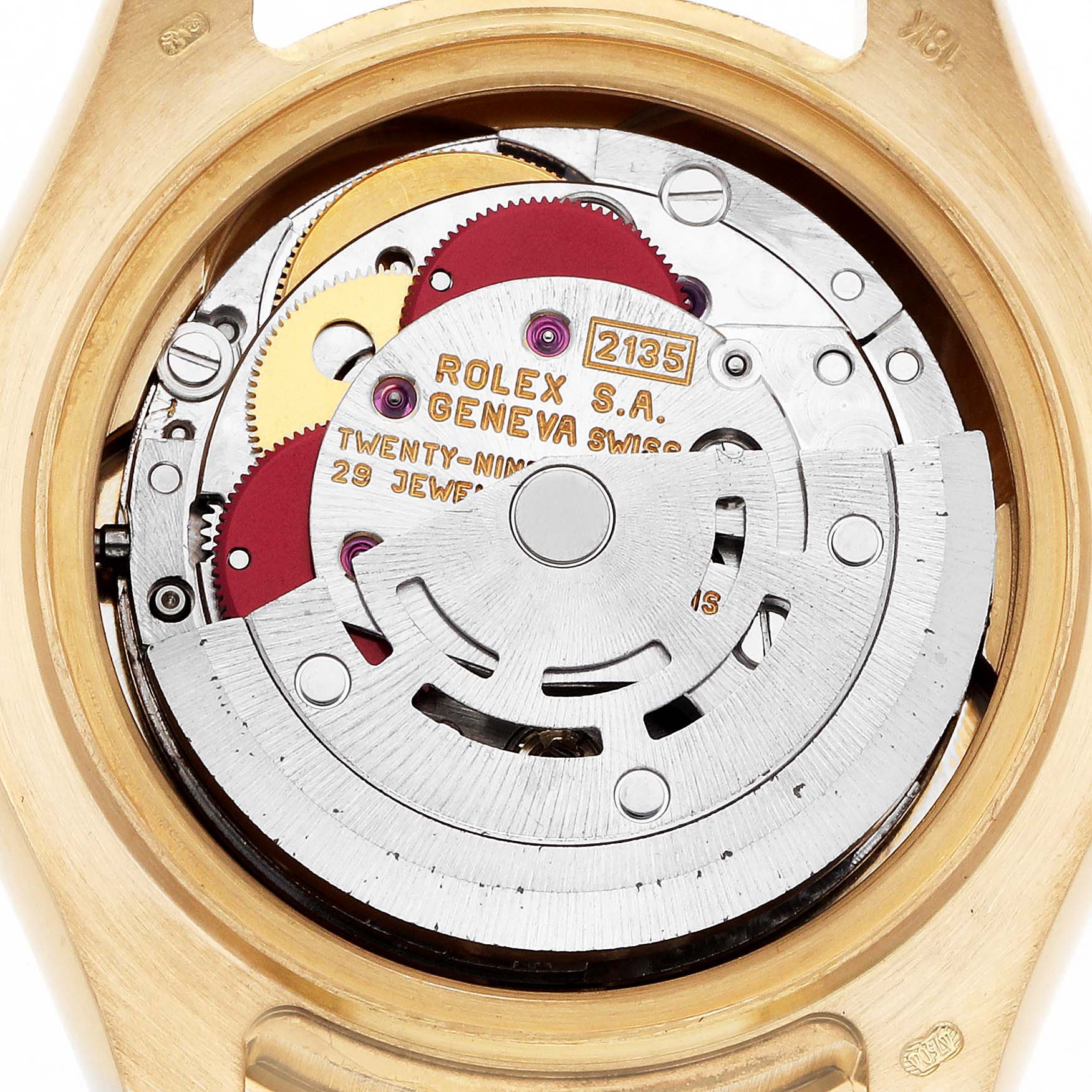 The image shows the movement of a Rolex Pearlmaster 69298 Women's Yellow Gold Mother of Pearl Dial 69298 Women's Yellow Gold Mother of Pearl Dial watch from a top-down angle, highlighting gears and markings.