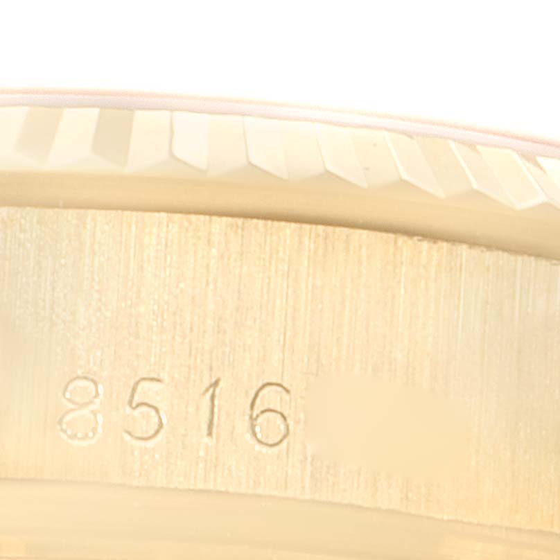 The image shows the engraved side of the bezel of a Rolex President 69178 Women's Yellow Gold Champagne Dial 69178 Women's Yellow Gold Champagne Dial watch, including part of the serial number.