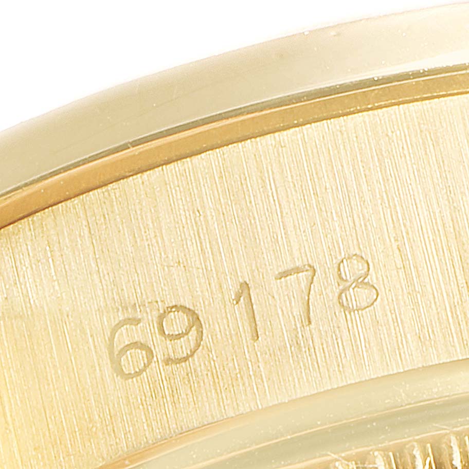 The image shows a close-up of the model number engraving on the case of a Rolex President 69178 Women's Yellow Gold Champagne Dial 69178 Women's Yellow Gold Champagne Dial watch.