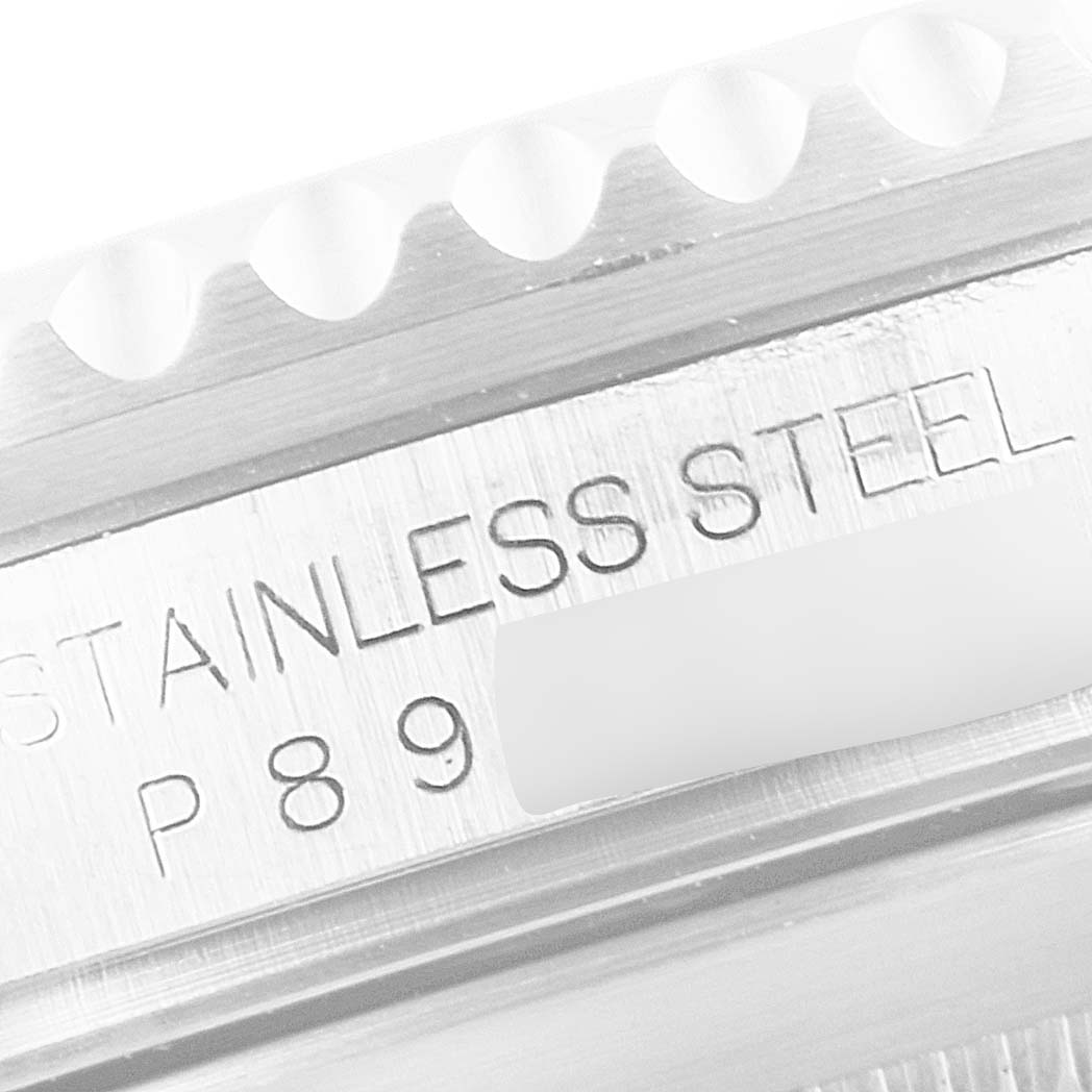 This image shows a close-up of the stainless steel casing with model engraving of a Rolex Submariner 16610 Men's Stainless Steel Black Dial 16610 Men's Stainless Steel Black Dial watch.