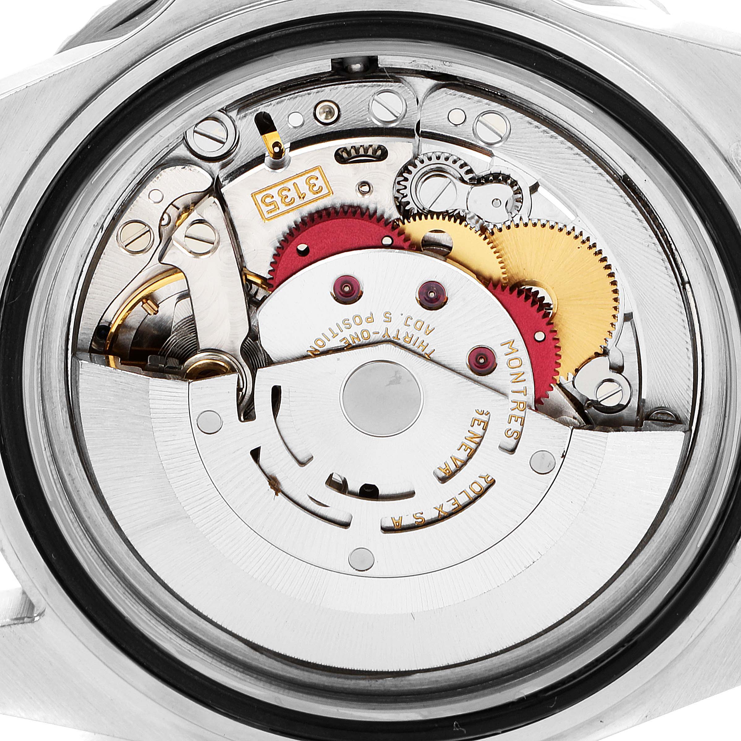 The image shows the internal movement mechanism of a Rolex Submariner 16610 Men's Stainless Steel Black Dial 16610 Men's Stainless Steel Black Dial watch from a rear angle.