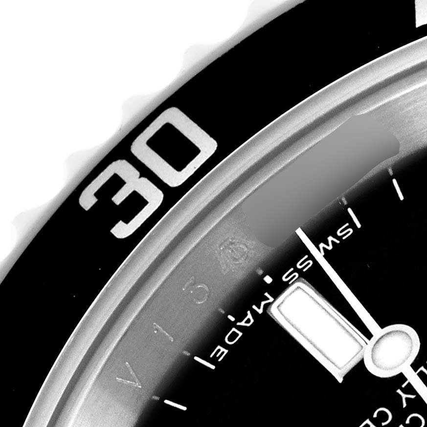 The image shows a close-up of the bezel and part of the dial of a Rolex Submariner 14060M Men's Stainless Steel Black Dial 14060M Men's Stainless Steel Black Dial, focusing on the "30" marking and minute hand.
