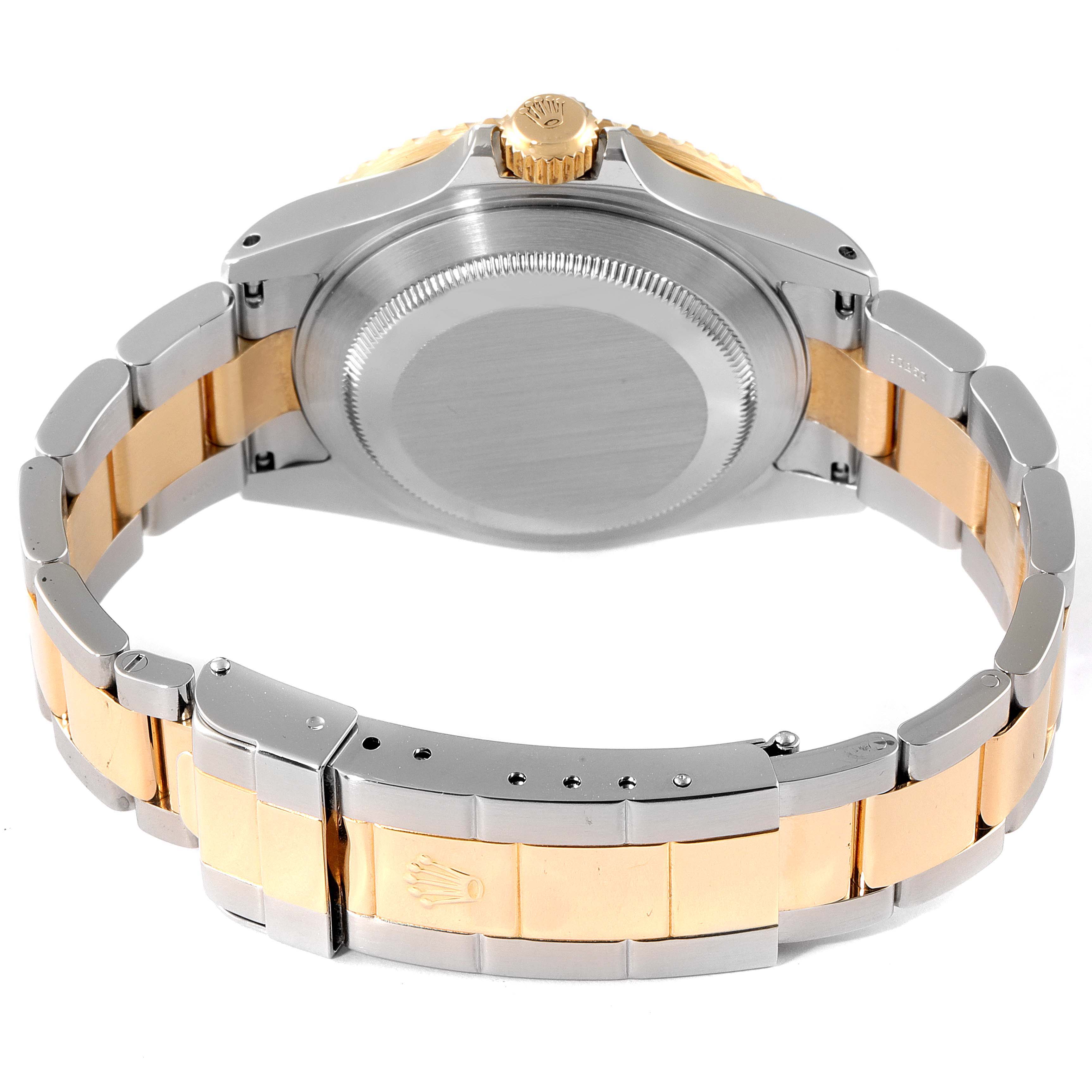 The image shows the back view of the Rolex Submariner 16613 Men
s Steel and Gold (two tone) Blue Dial 16613 Men
s Steel and Gold (two tone) Blue Dial, featuring its case back, crown, and bracelet.