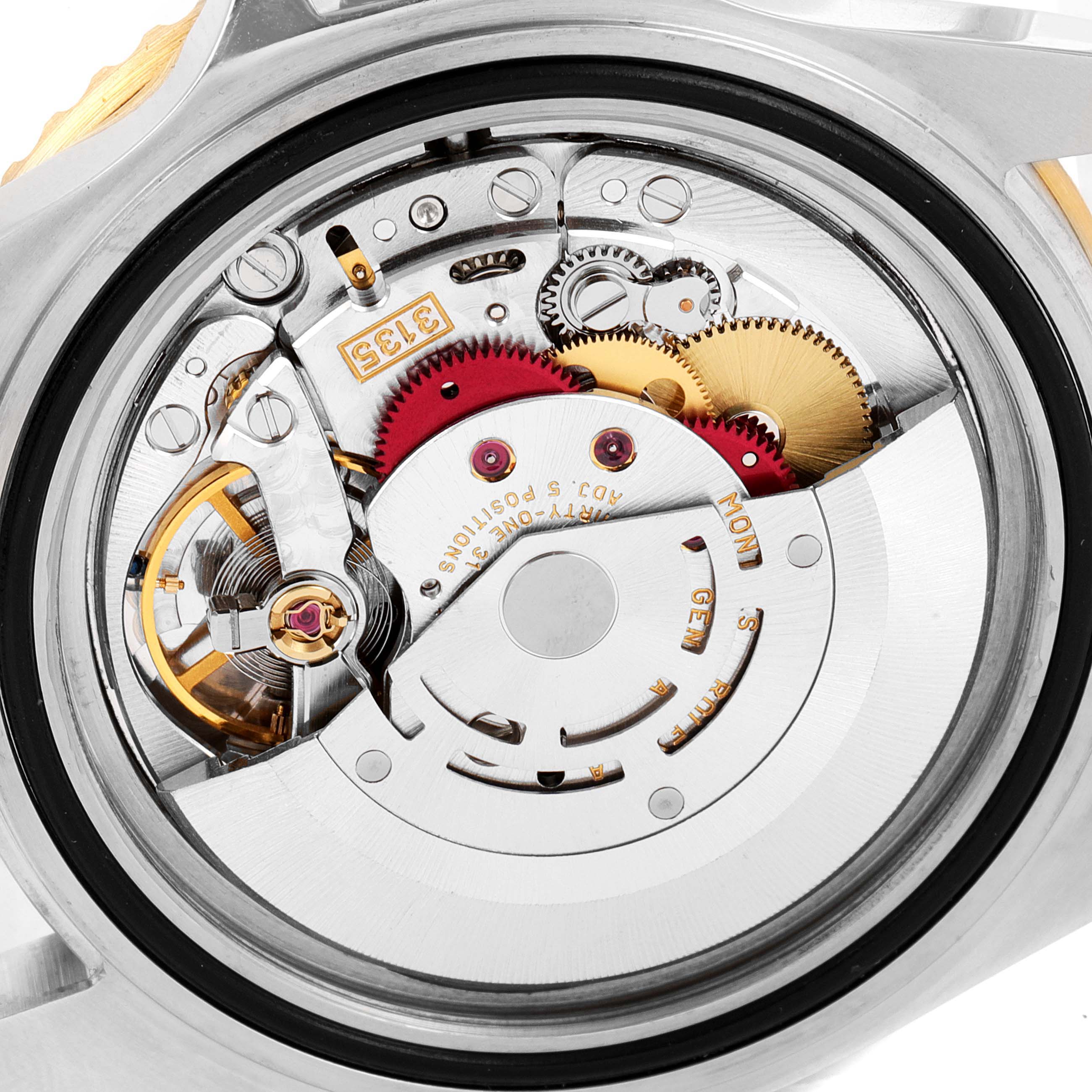 This is a close-up view of the movement mechanism inside a Rolex Submariner 16613 Men
s Steel and Gold (two tone) Blue Dial 16613 Men
s Steel and Gold (two tone) Blue Dial watch.