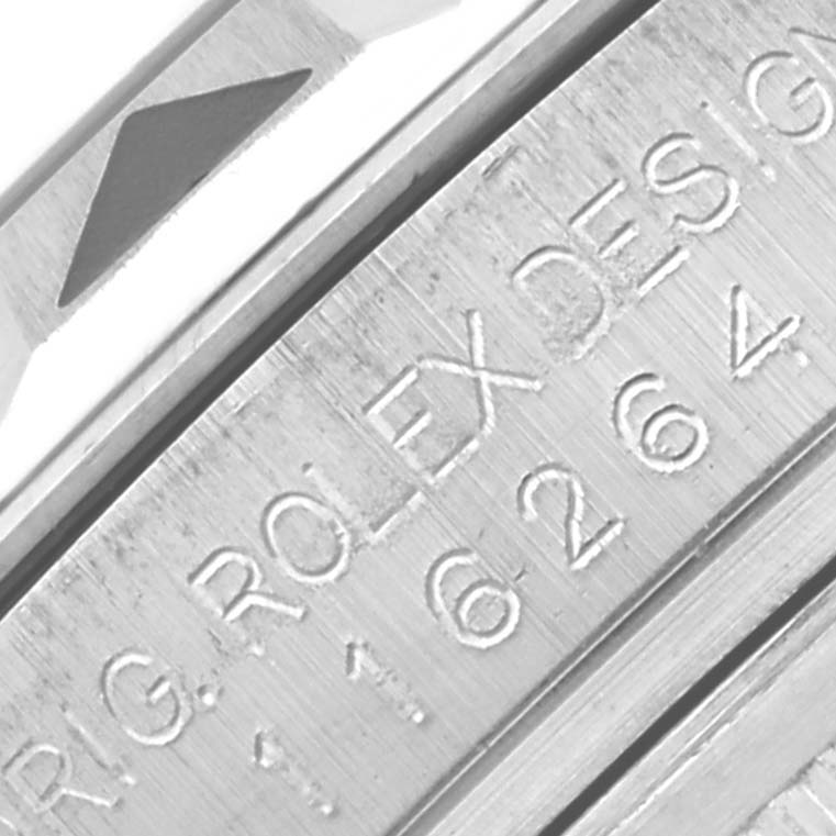 The image shows an angled close-up of the Rolex Turn-o-Graph 116264 Men's Stainless Steel Black Dial 116264 Men's Stainless Steel Black Dial's engraved inner bezel with text detailing.