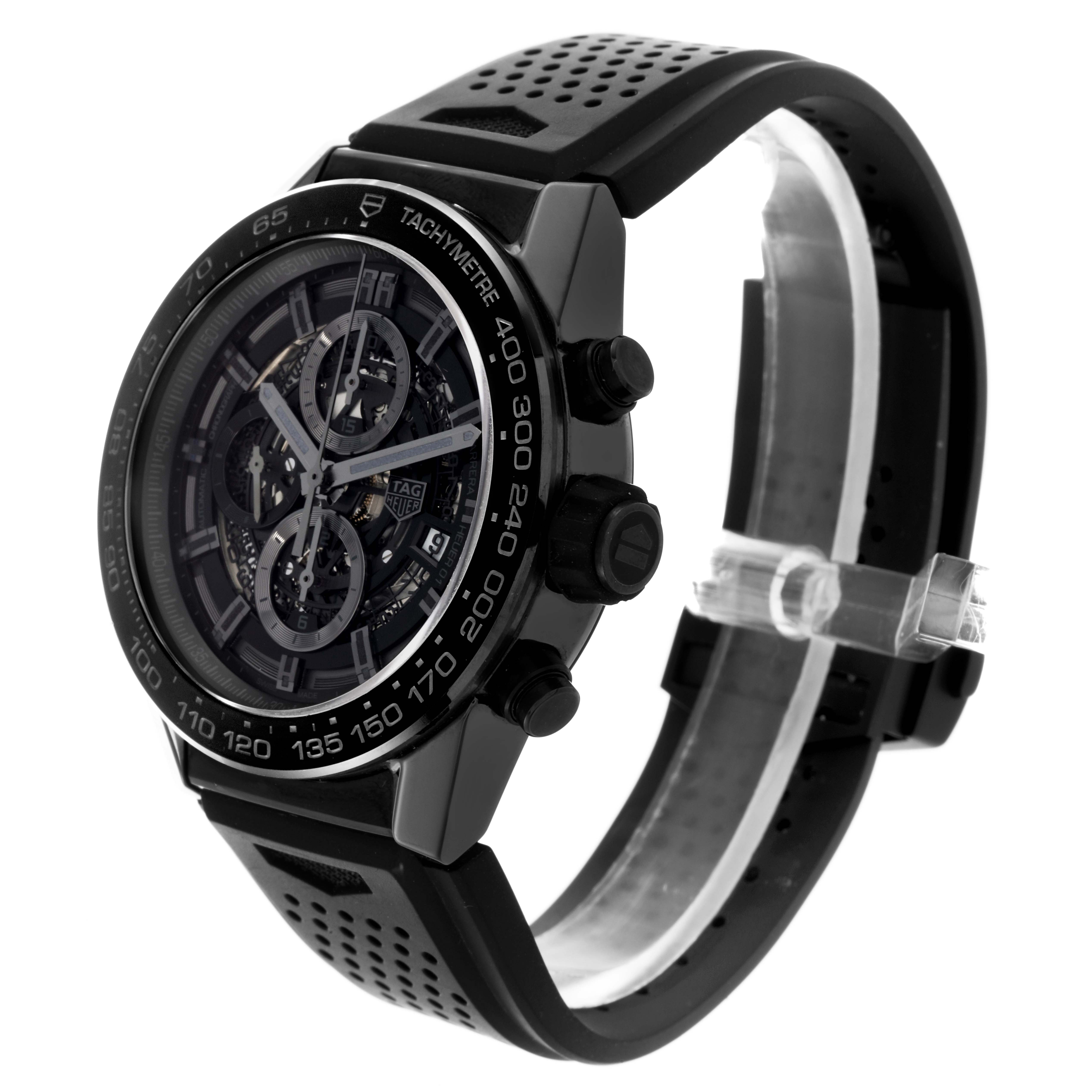 The Tag Heuer Carrera CAR2A90.FT6071 Men's Ceramic Black Dial CAR2A90.FT6071 Men's Ceramic Black Dial watch is shown at a three-quarter angle, highlighting the dial, tachymeter bezel, and perforated strap.