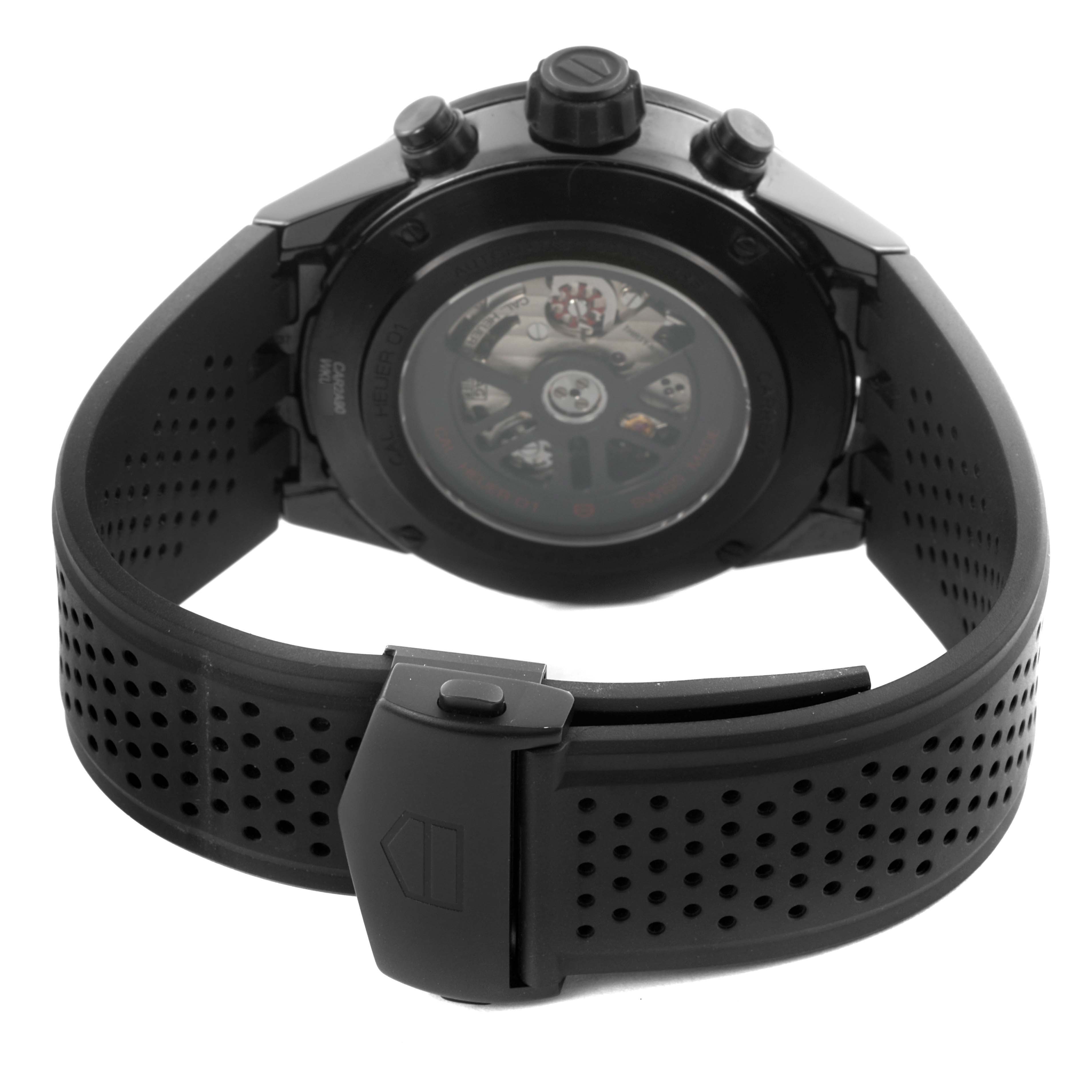 The image shows the back of a Tag Heuer Carrera CAR2A90.FT6071 Men's Ceramic Black Dial CAR2A90.FT6071 Men's Ceramic Black Dial watch, highlighting the case back, strap, and clasp.