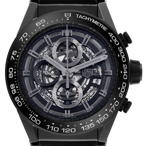 The image shows a TAG Heuer Carrera watch from the front, highlighting its dial, skeleton design, and tachymeter bezel.