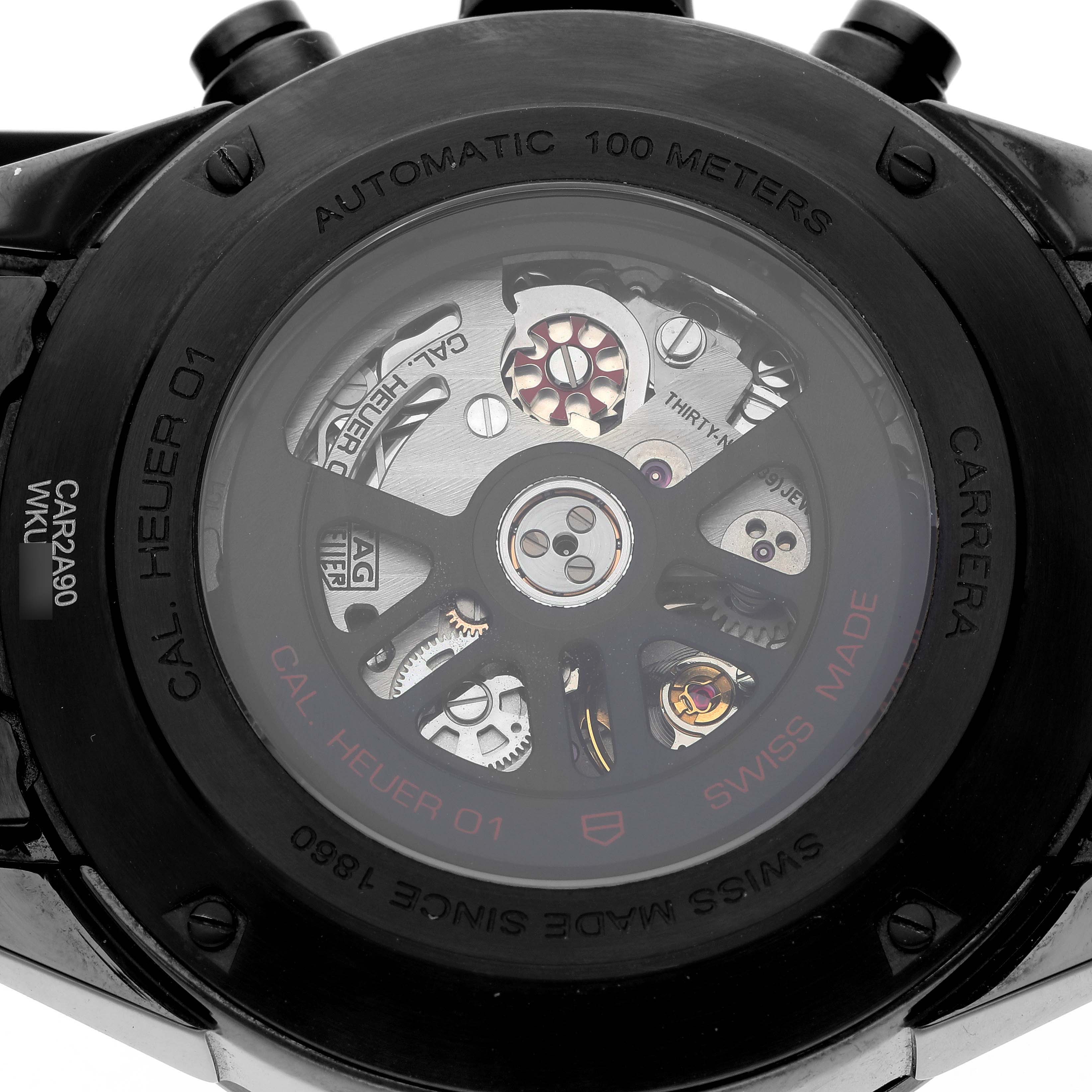The image shows the back view of a Tag Heuer Carrera CAR2A90.FT6071 Men's Ceramic Black Dial CAR2A90.FT6071 Men's Ceramic Black Dial watch, highlighting the automatic movement and internal mechanisms.