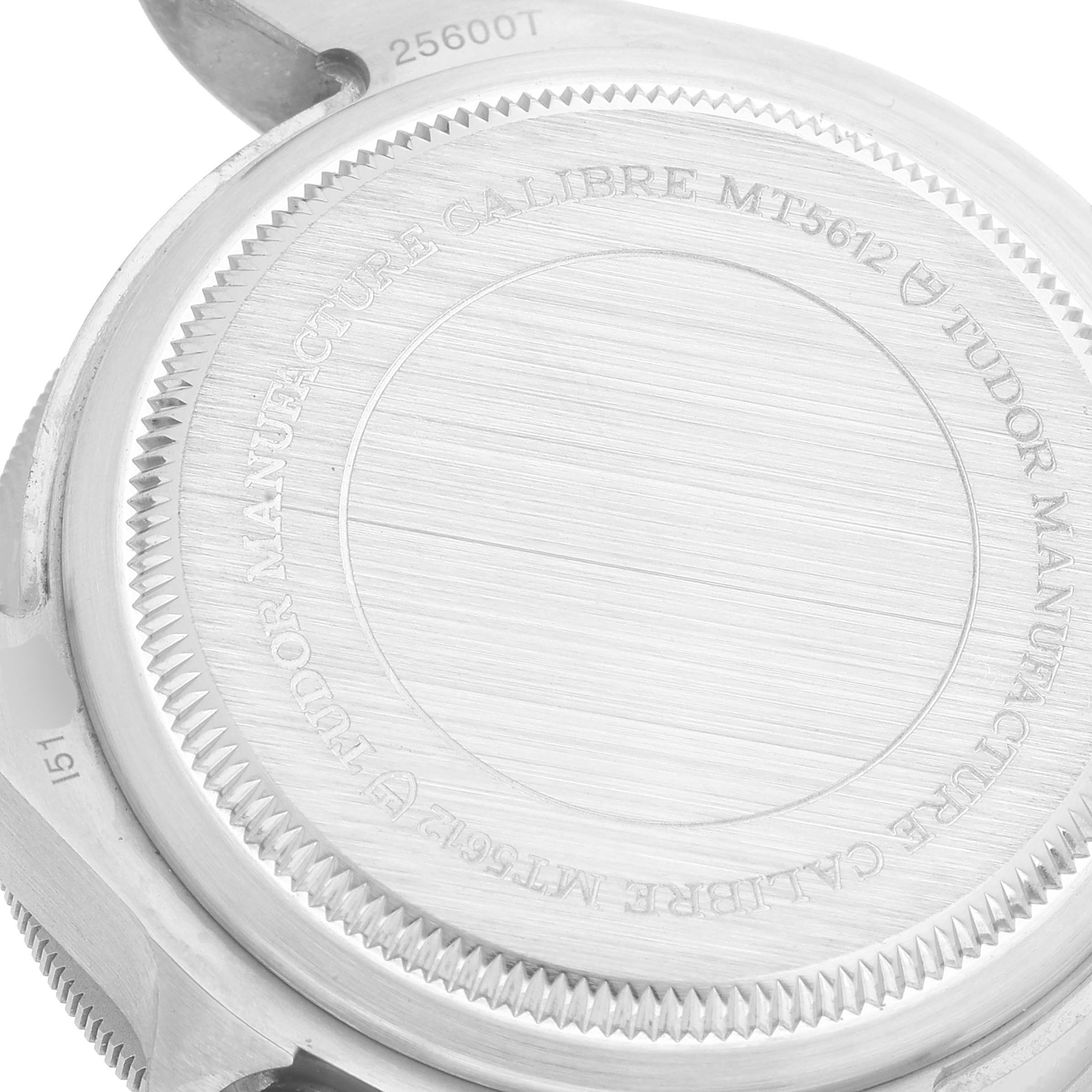 The image shows the case back of a Tudor Pelagos 25600TN Men's Titanium Black Dial 25600TN Men's Titanium Black Dial watch, emphasizing its detailed engravings and stainless steel finish.