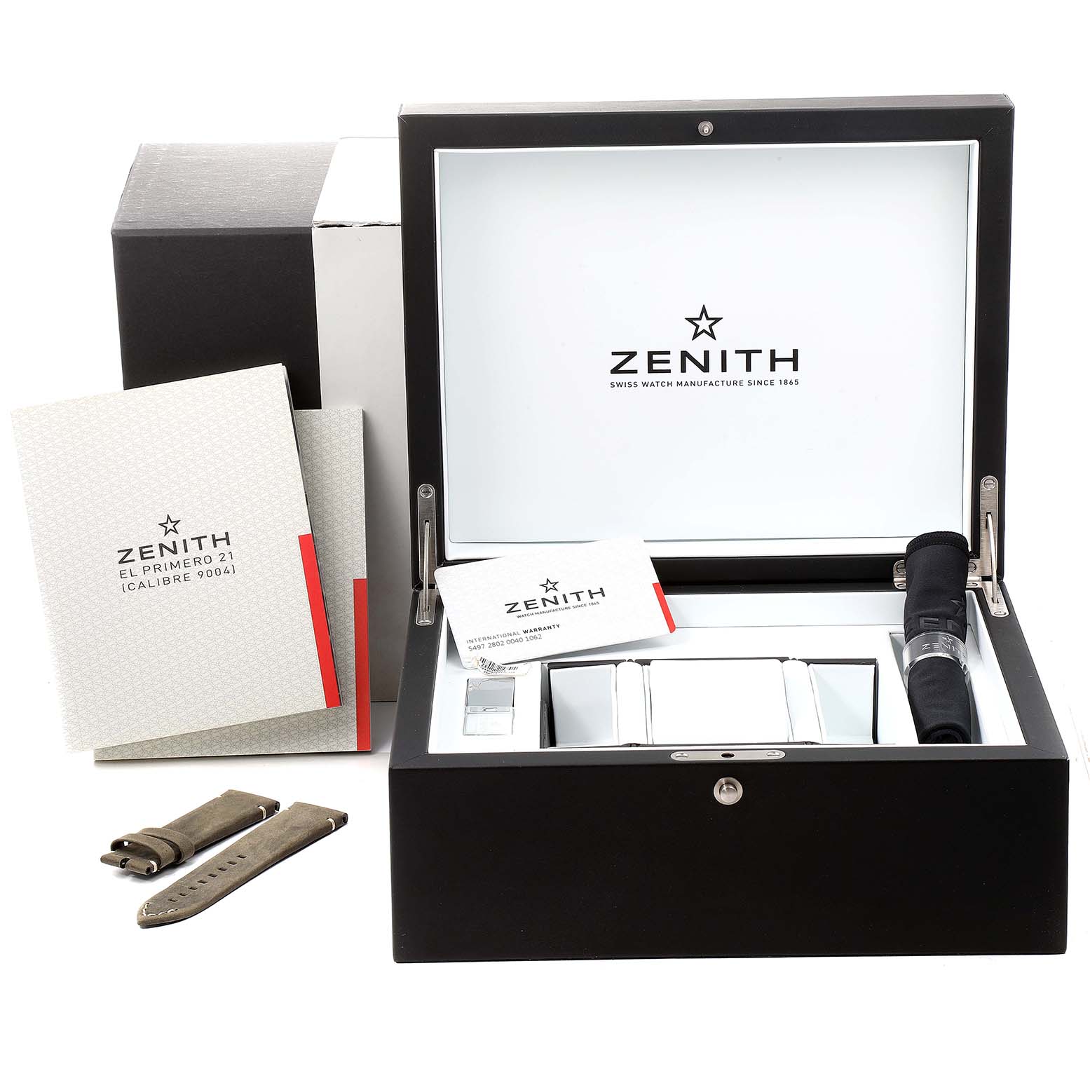 The image shows a Zenith Pilot 11.2430.4069/21.C773 Men's Stainless Steel Grey Dial 11.2430.4069/21.C773 Men's Stainless Steel Grey Dial watch set with a box, booklets, an extra strap, and watch accessories.