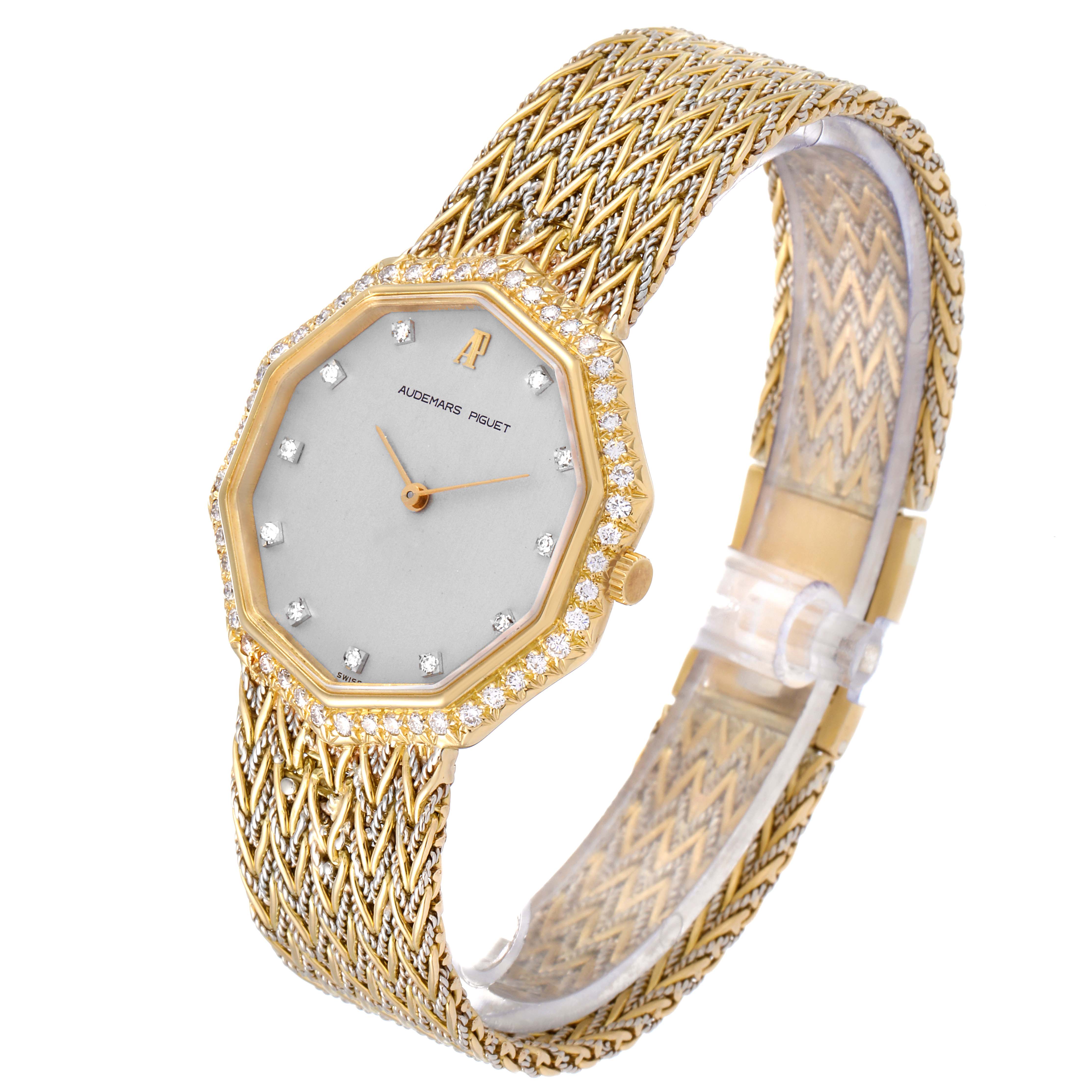 The image shows a Vintage Audemars Piguet watch at an oblique angle, highlighting its gold mesh band, octagonal face, and diamond-encrusted bezel.