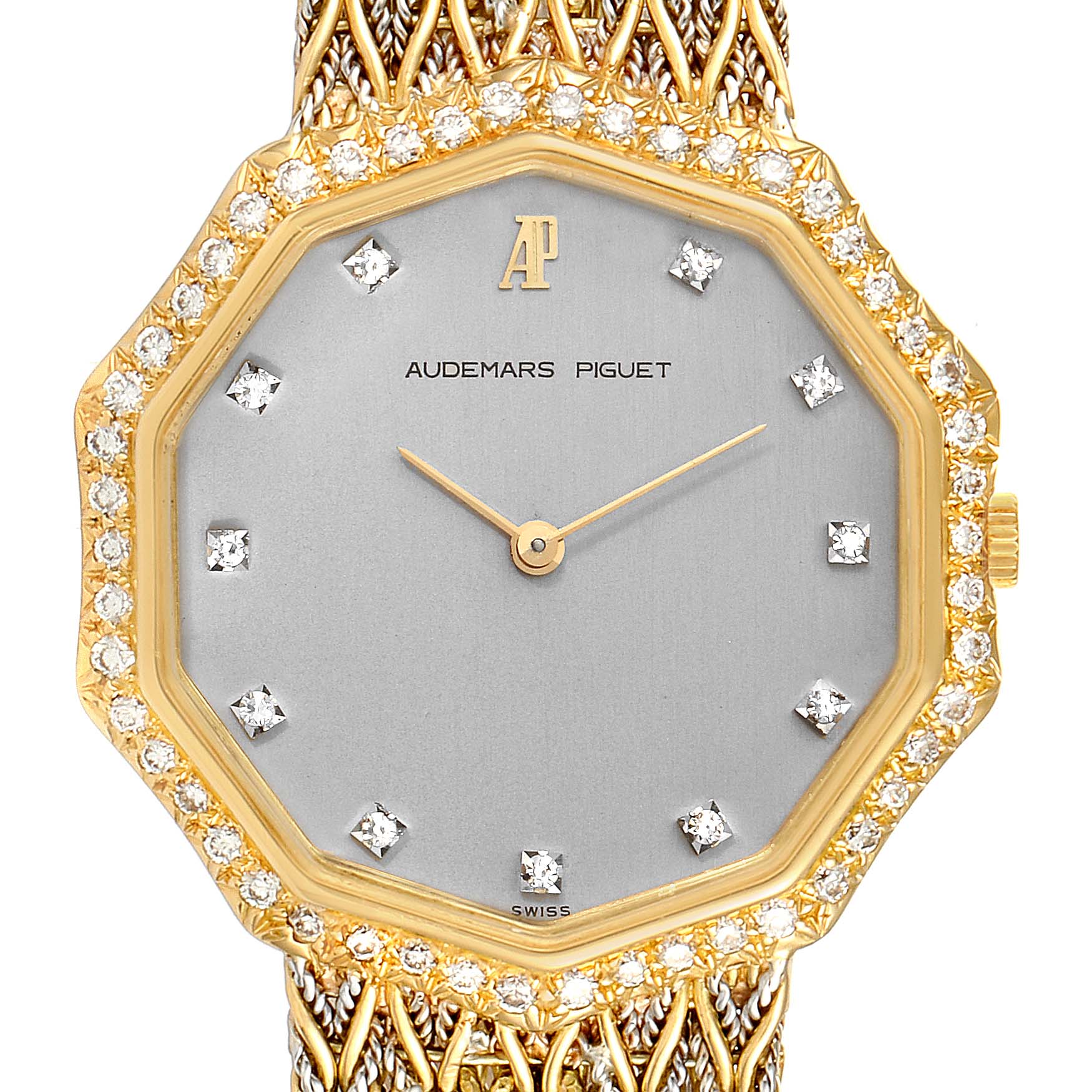 This image shows a front view of a Vintage Audemars Piguet watch with a diamond-studded bezel and a gold mesh strap.