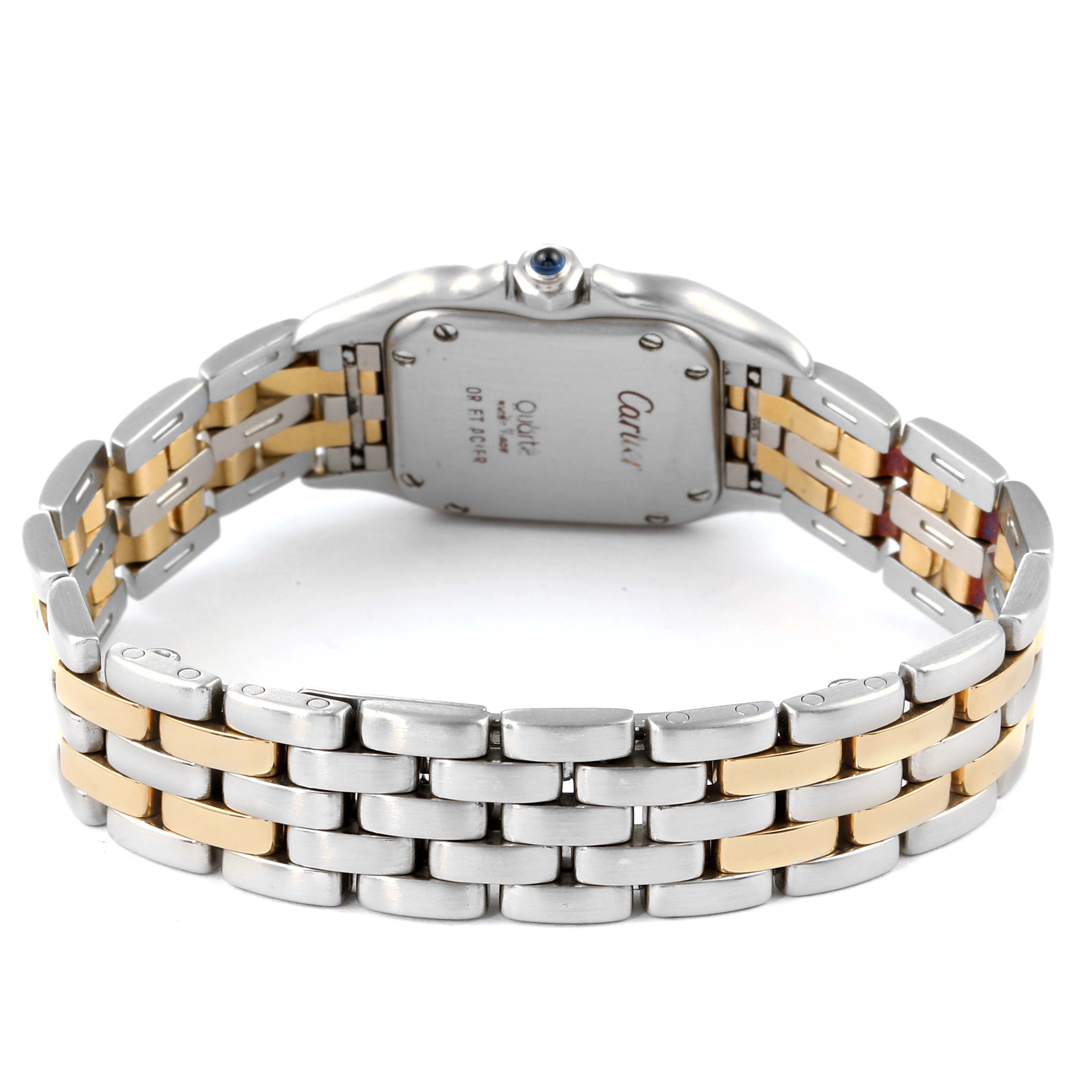 The image shows the back angle of a Cartier Panthère watch, highlighting its case back and two-tone bracelet.