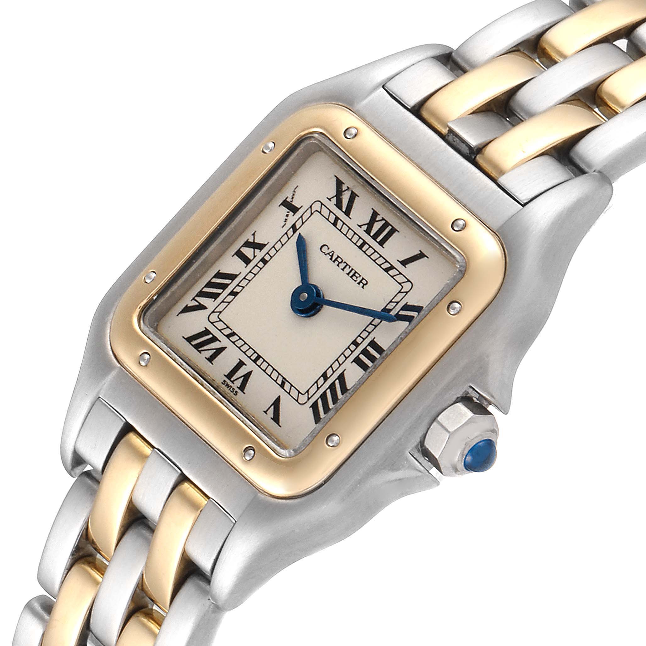 This image shows a close-up, angled view of the Cartier Panthere W25029B6 Women's Steel and Gold (two tone) Silver Dial W25029B6 Women's Steel and Gold (two tone) Silver Dial watch, highlighting the face, bezel, and part of the bracelet.