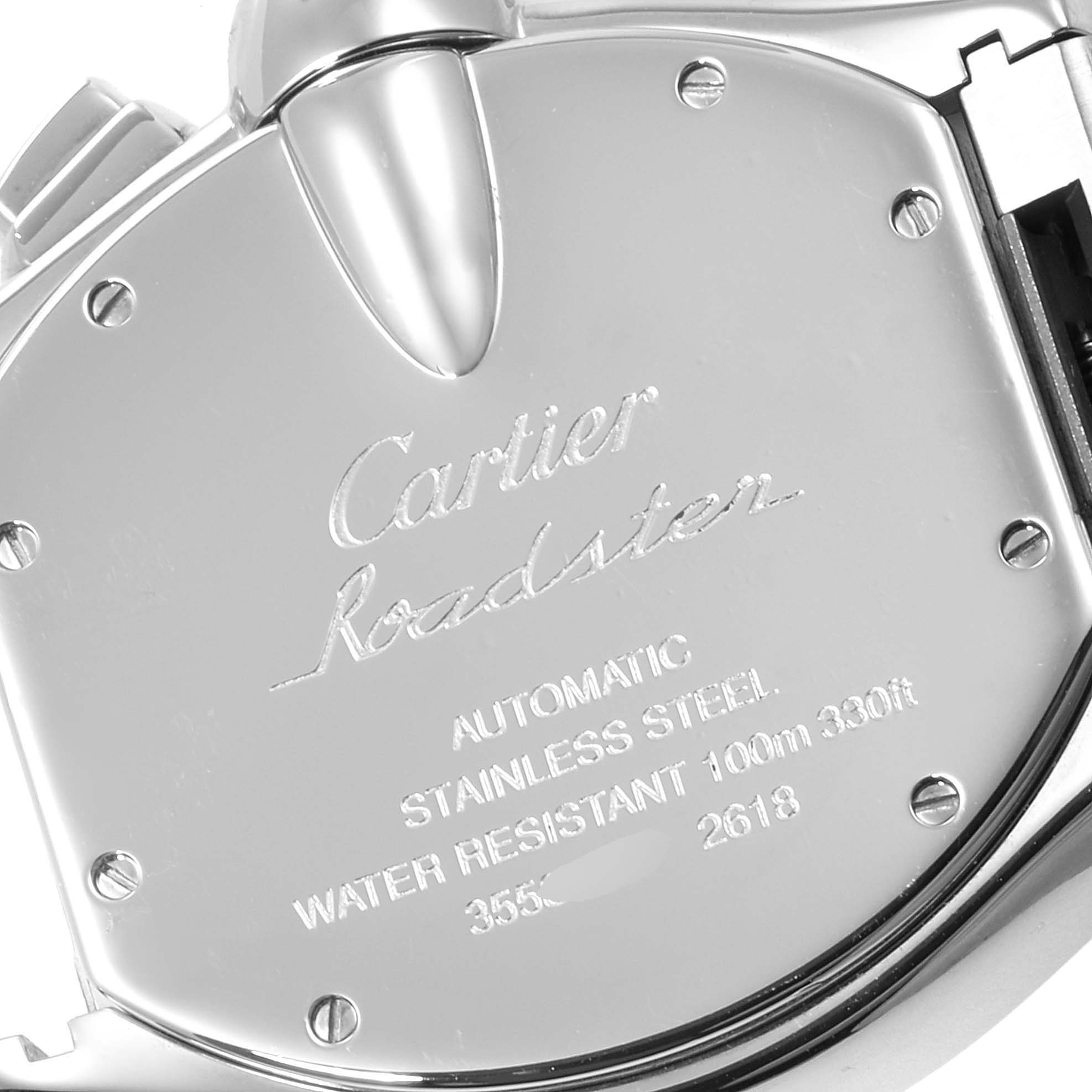 The image shows the back case of a Cartier Roadster W62020X6 Men
s Stainless Steel Black Dial W62020X6 Men
s Stainless Steel Black Dial watch, with engravings detailing its specifications.
